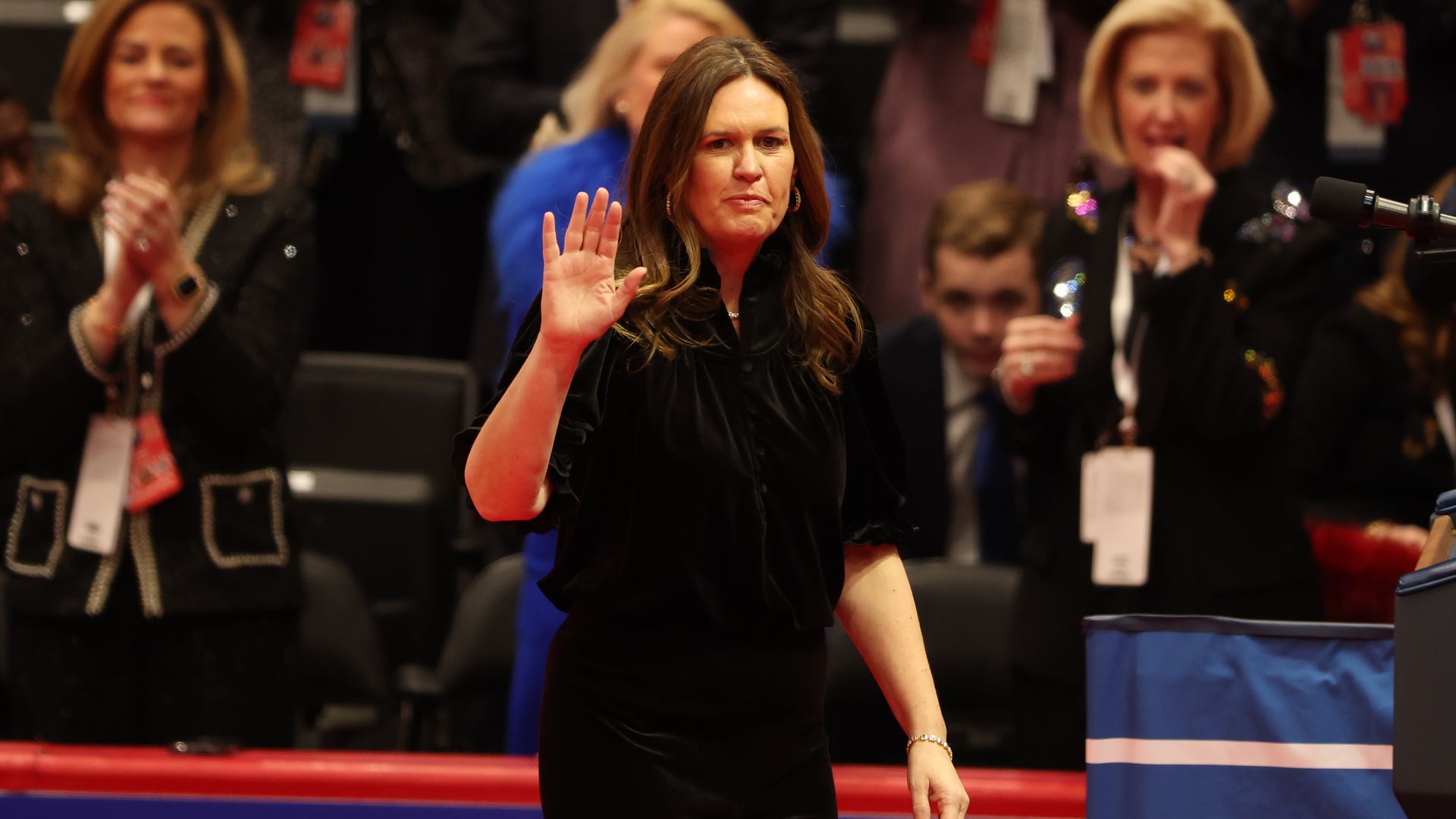 Arkansas Gov. Sarah Huckabee Sanders takes the stage during the Presidential Inaugural Parade at Capital One Arena on January 20, 2025 in Washington, DC. Donald Trump takes office for his second term as the 47th president of the United States. (Photo by Justin Sullivan/Getty Images)