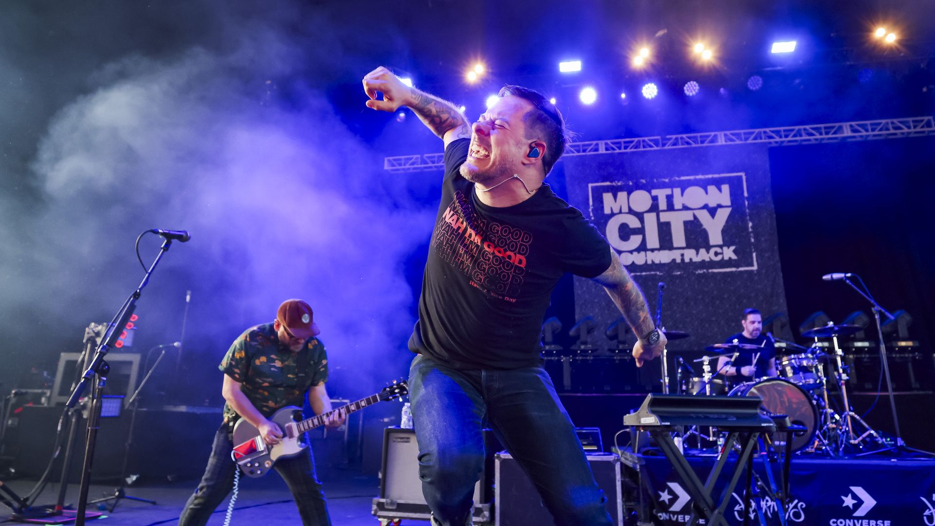 Joshua Cain, Jesse Johnson and Tony Thaxton of Motion City Soundtrack performs during the Sad Summer Tour at Michigan Lottery Amphitheatre