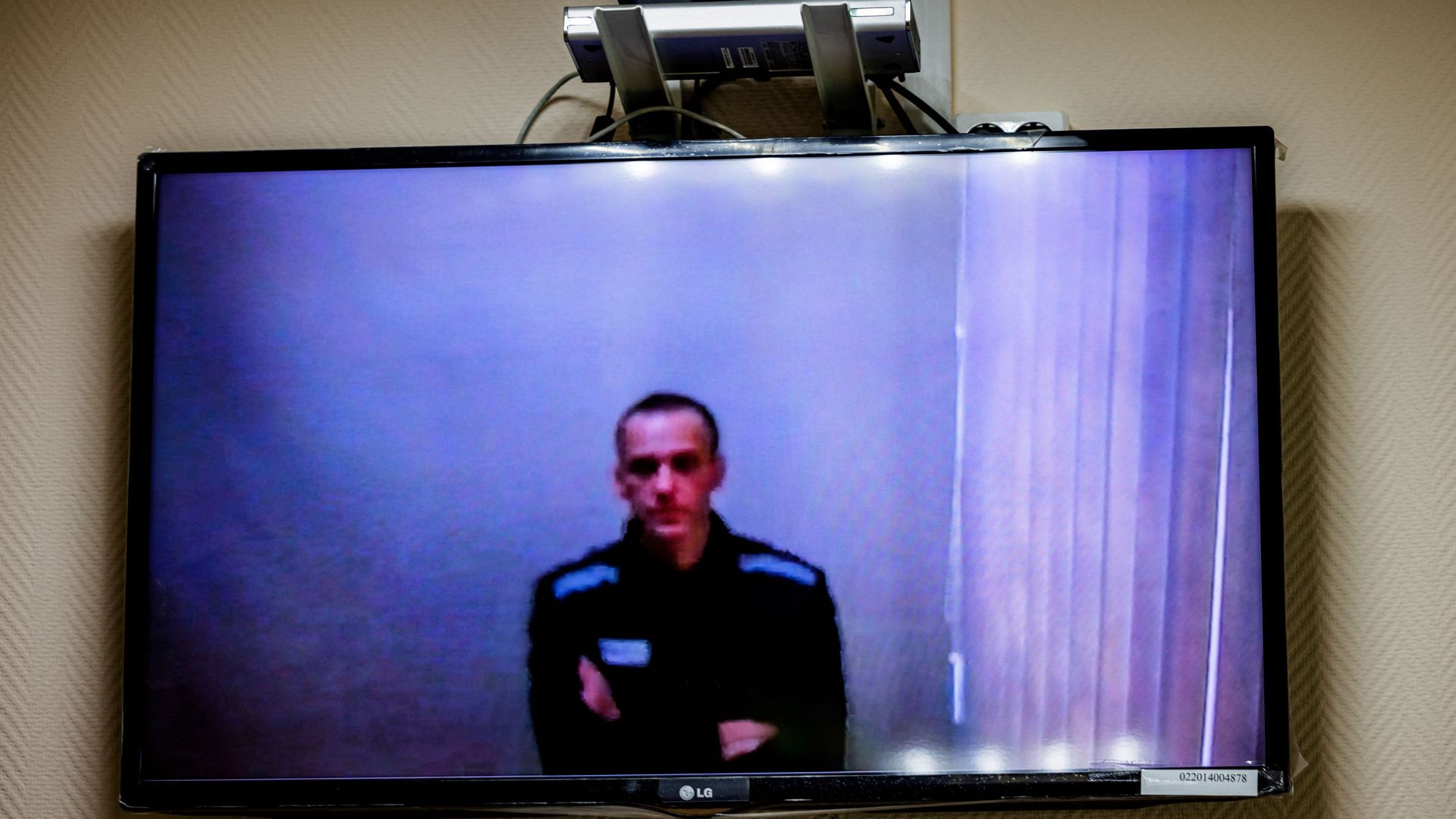 Alexei Navalny on a screen during a court hearing in Petushki, Russia, in May 2021.