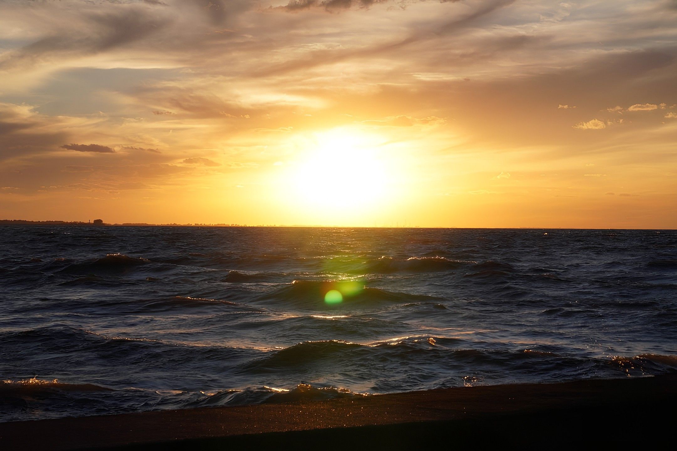Photo of a sunset over a lake. 