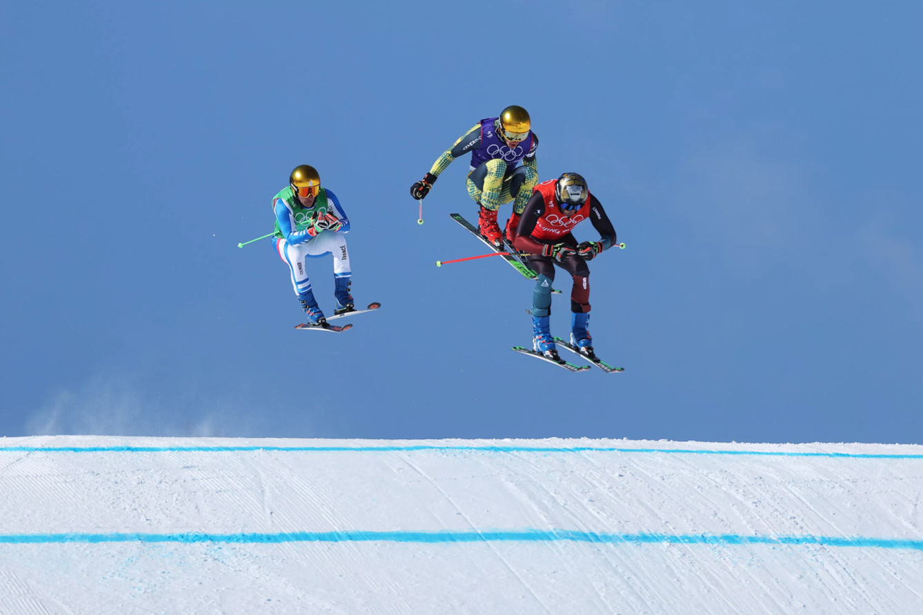 France's Jean Frederic Chapuis, Germany's Daniel Bohnacker and Switzerland's Alex Fiva during the men's Olympic ski cross 1/8 finals at Genting Snow Park on in Zhangjiakou, China, on Feb. 18. 