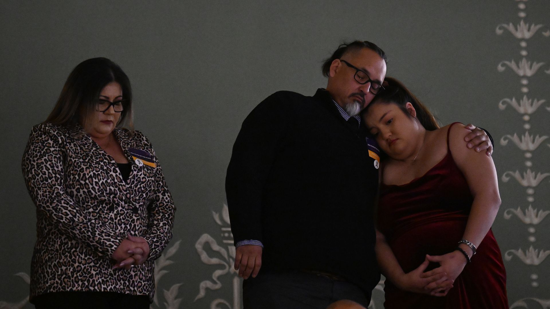 Richard Fierro, center, with his wife, left, and daughter attended Colorado Gov. Jared Polis' 2023 state of the state address to a joint session of the legislature in the House chamber at the state Capitol on January 17, 2023 in Denver.