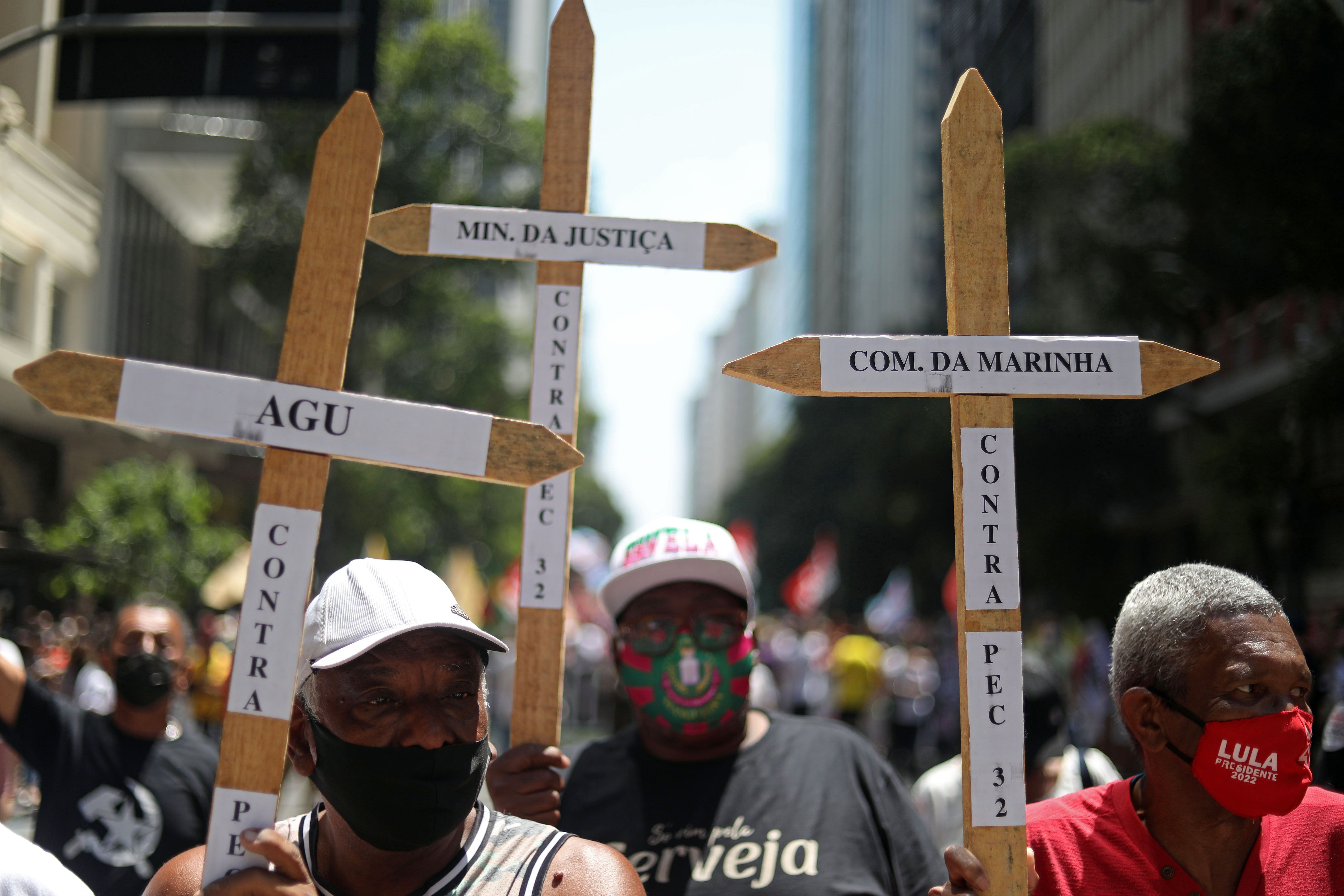 Protesters with crosses at an anti-Bolsonaro demonstration in Rio de Janeiro on October 2. 