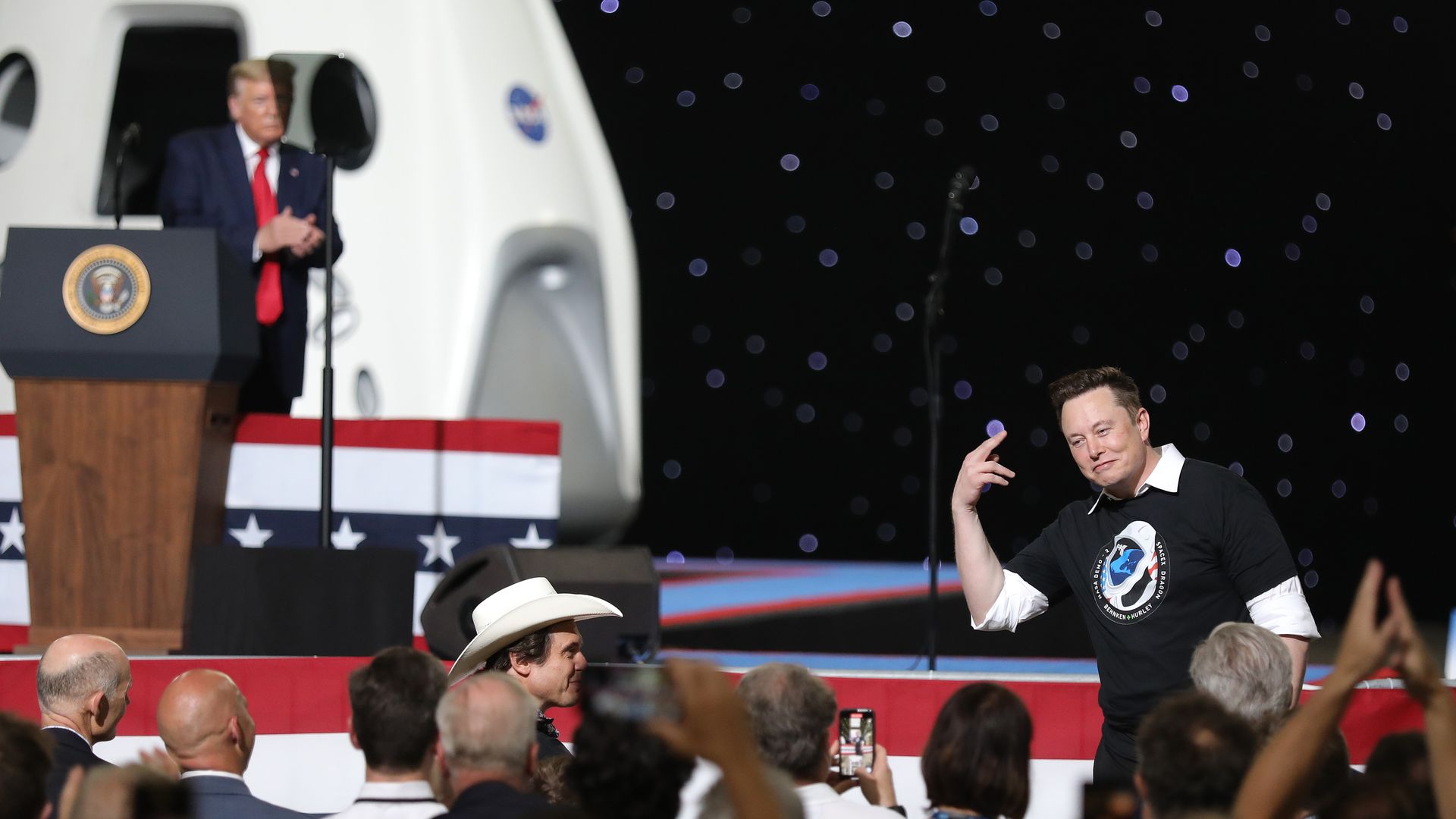 President Donald Trump acknowledges Spacex founder Elon Musk (R) after the successful launch of the SpaceX Falcon 9 rocket with the manned Crew Dragon spacecraft at the Kennedy Space Center on May 30, 2020 in Cape Canaveral, Florida.