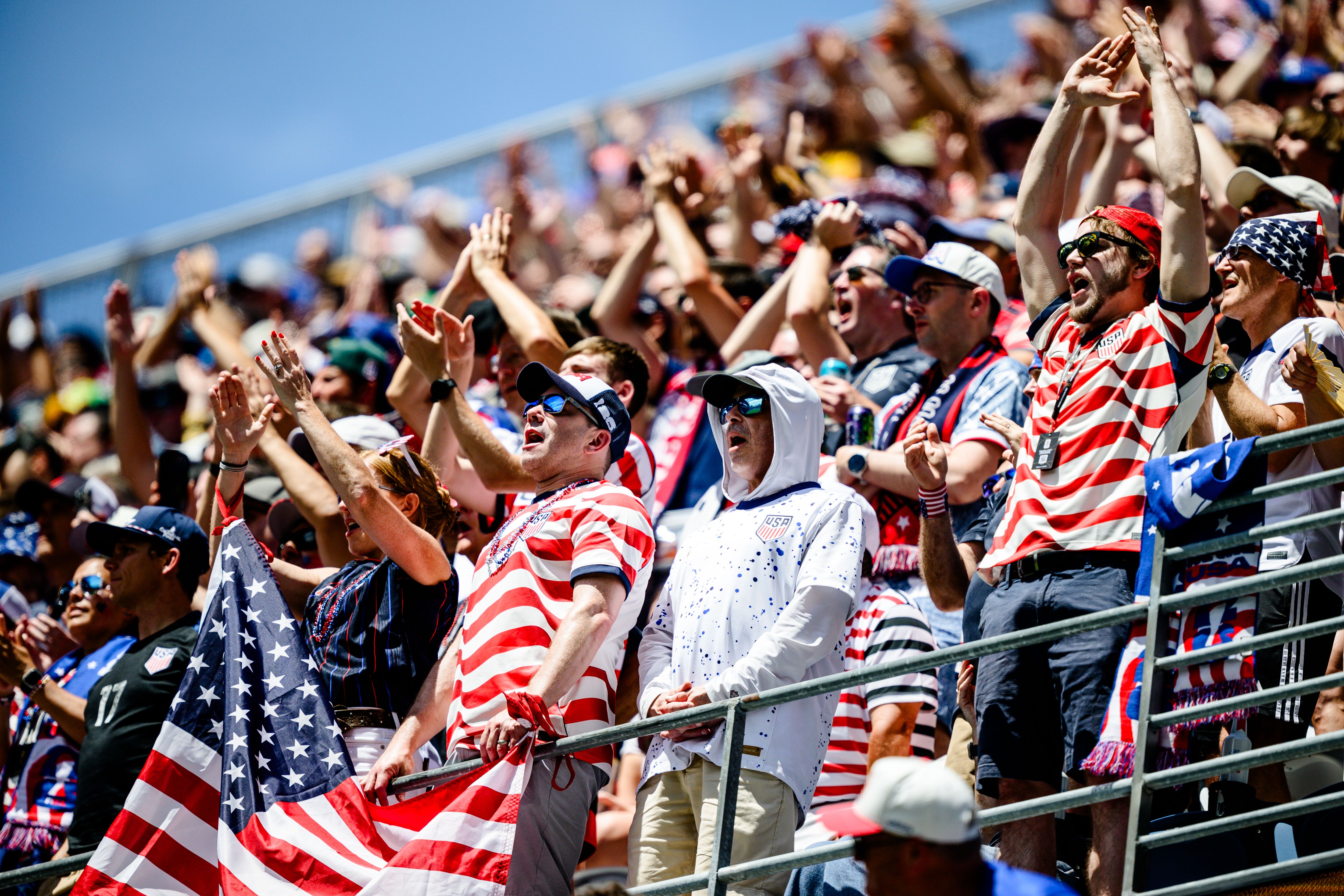 Spectators in red, white and blue cheer for the U.S. during a World Cup match in Seattle. 