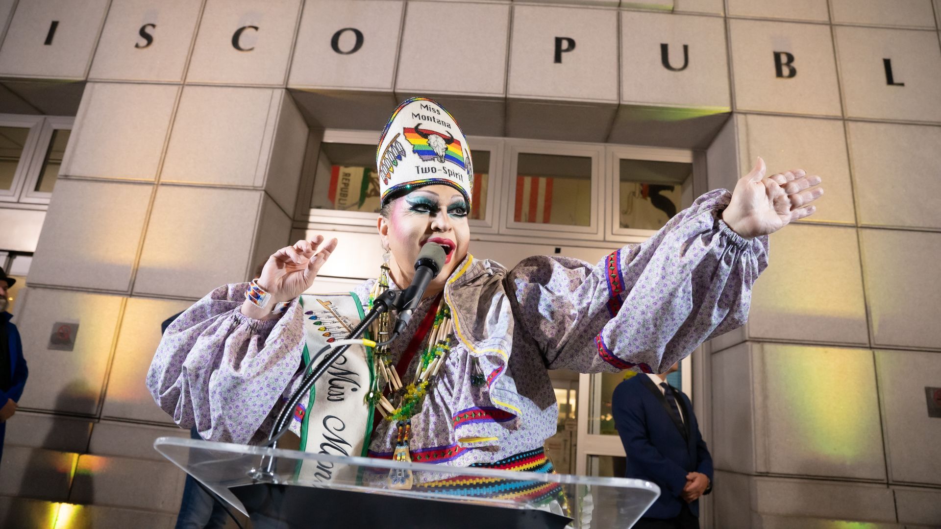 A drag queen speaks during Night of Ideas in San Francisco.