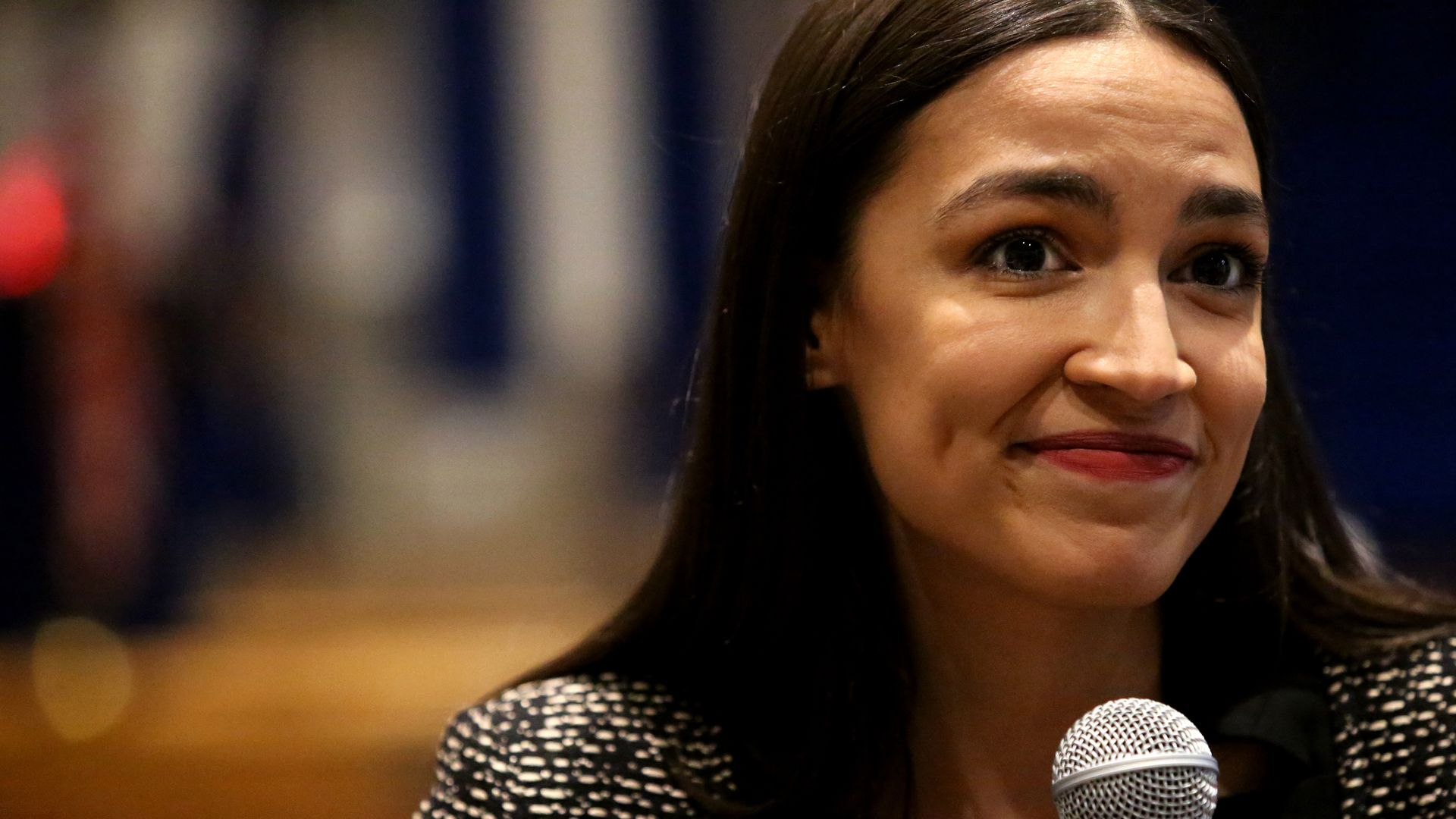 Alexandria Ocasio-Cortez (D-NY) speaks with members of the media before a Green New Deal For Public Housing Town Hall 