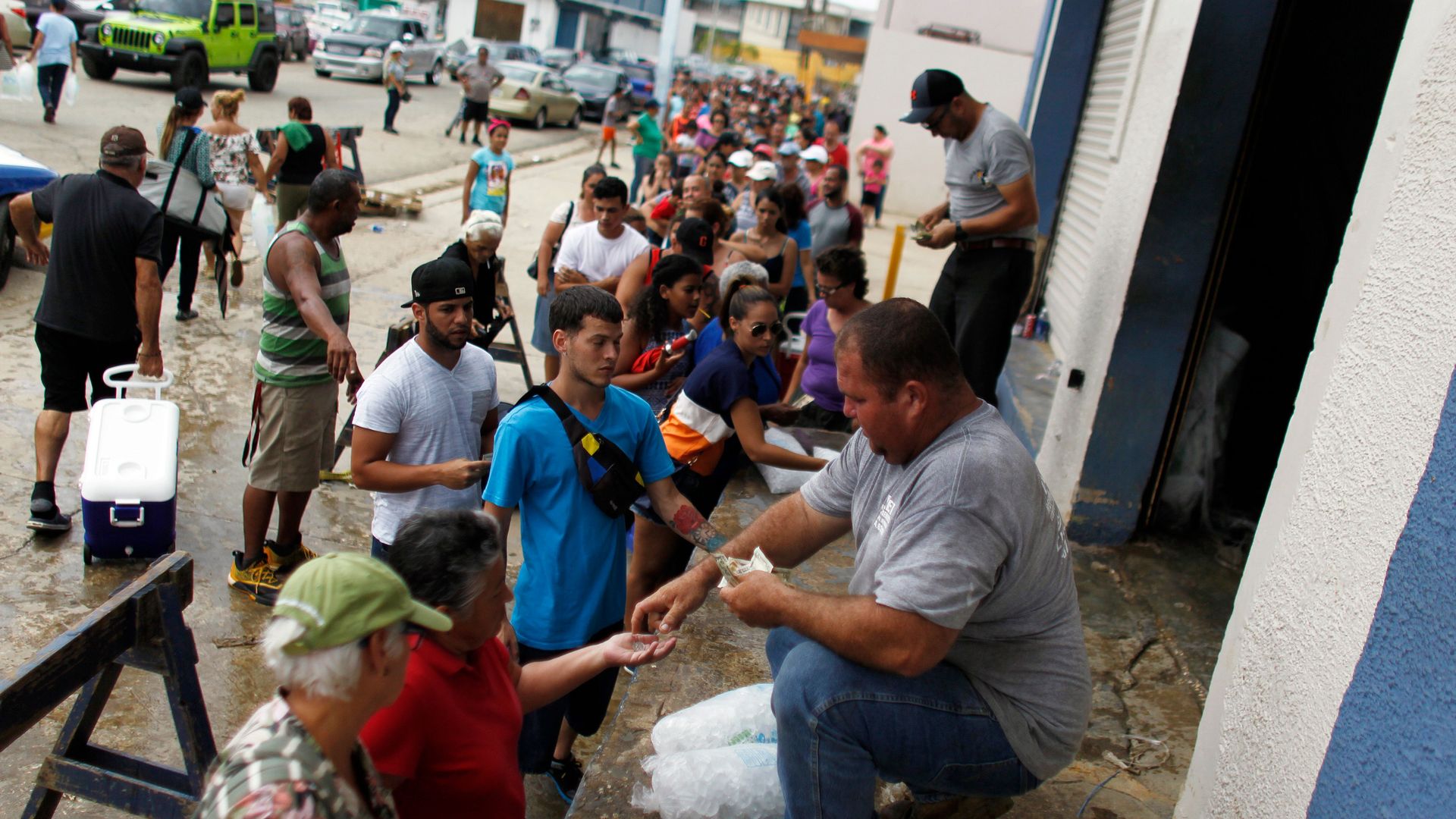 Puerto Ricans line up to purchase ice