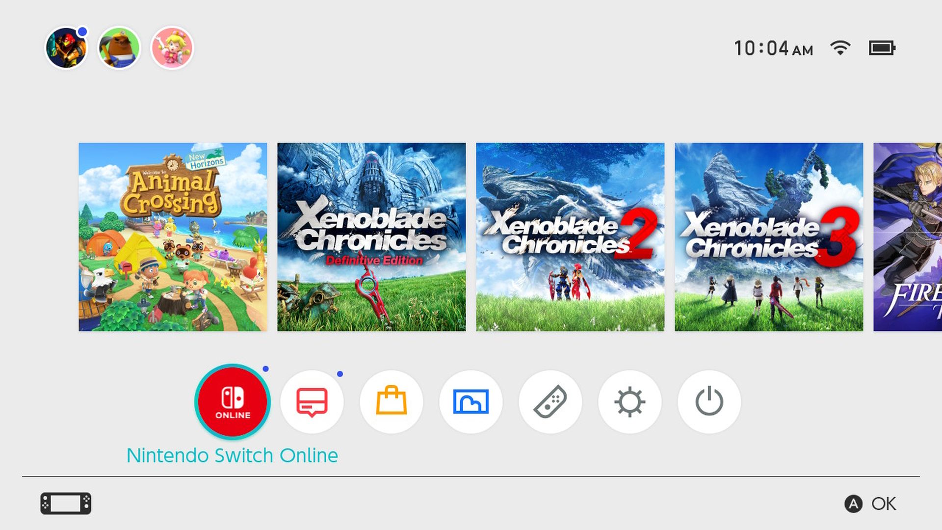 Screenshot of icons showing games from the Xenoblade series. Each has grass in the foreground and a giant creature in the blue sky behind them. Two line up evenly. The third does not.