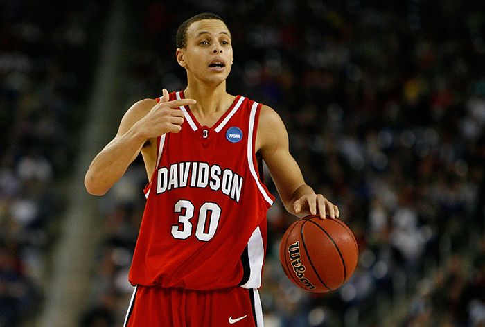 DETROIT - MARCH 30: Stephen Curry #30 of the Davidson Wildcats directs the offense against the Kansas Jayhawks during the Midwest Regional Final of the 2008 NCAA Division I Men's Basketball Tournament at Ford Field on March 30, 2008 in Detroit, Michigan. Kansas won 59-57. (Photo by Gregory Shamus/Getty Images)