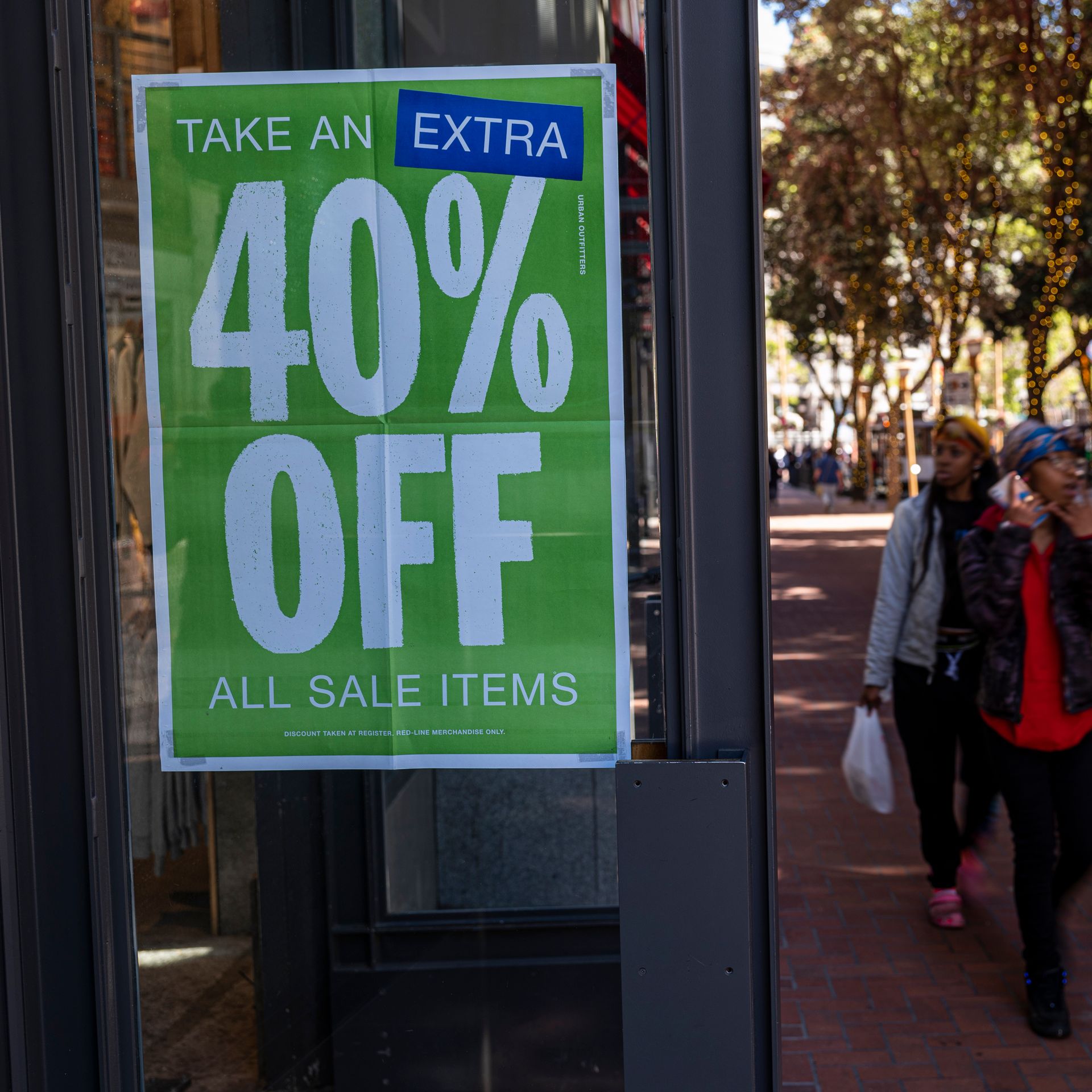 A sale sign in the window of a store in San Francisco.