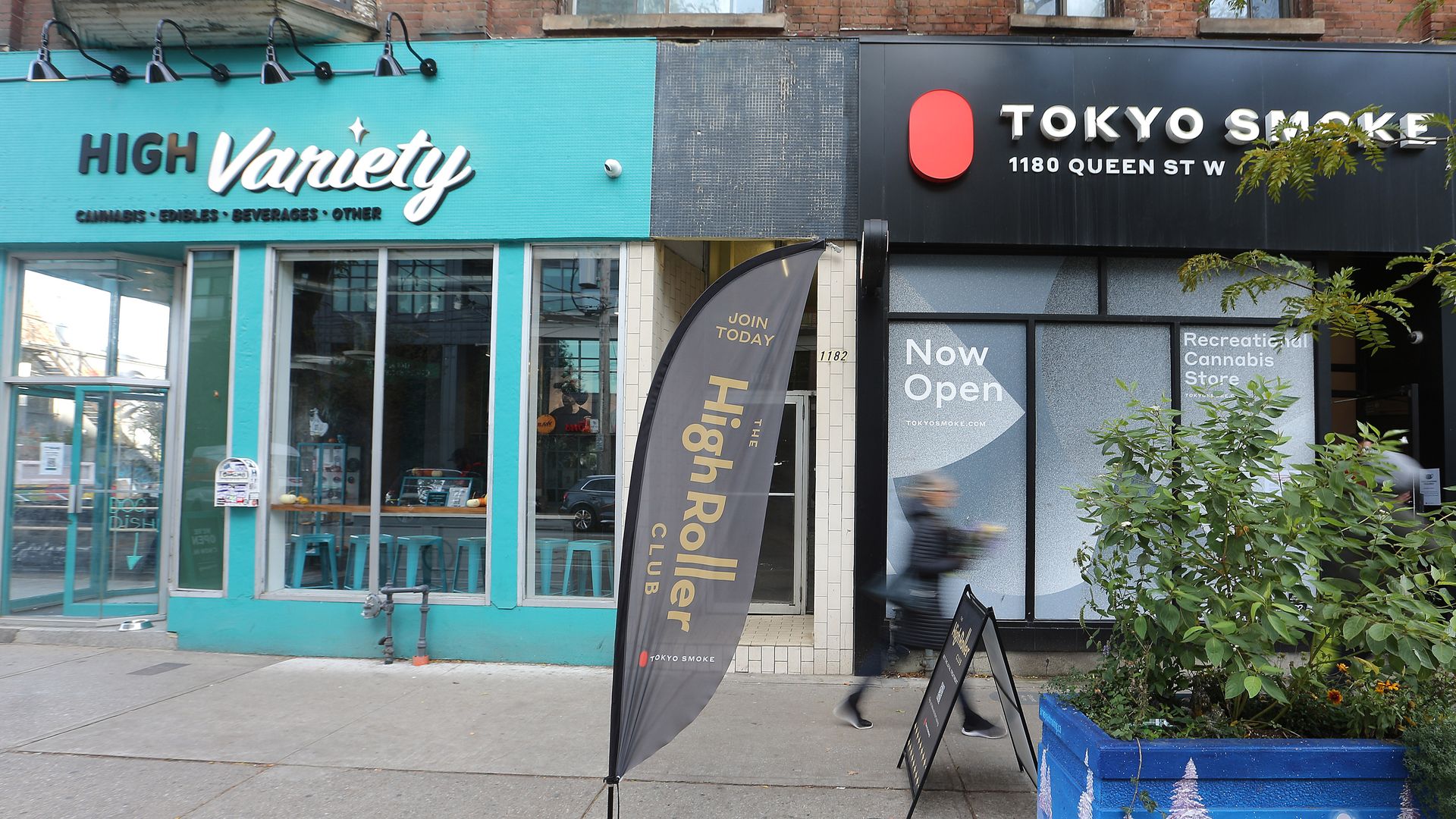 Photo of a storefront showing "Tokyo Smoke" on the right and "High Variety on the left"
