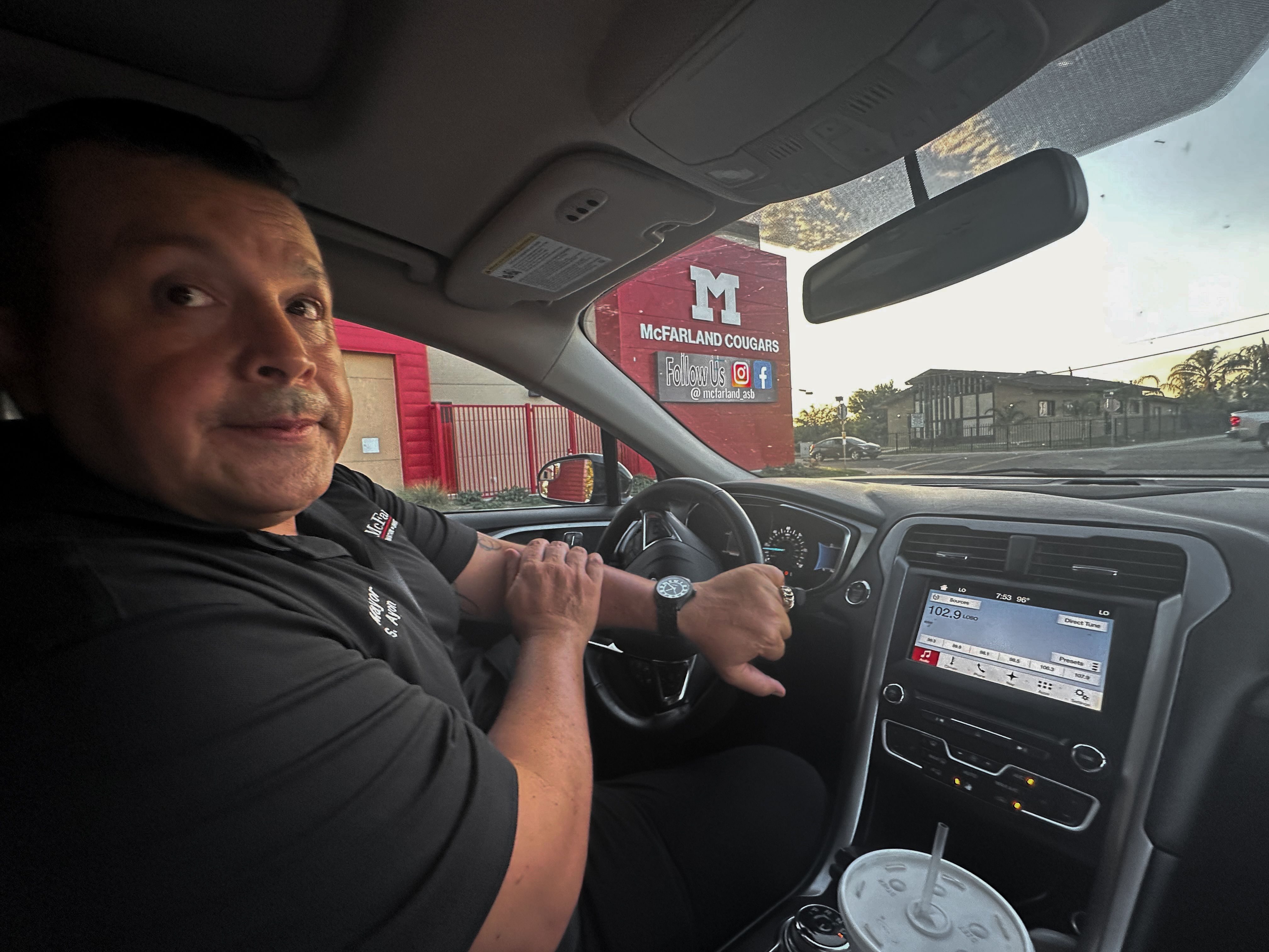 McFarland, California mayor Saul Ayon drives around town in front of the city's high school.