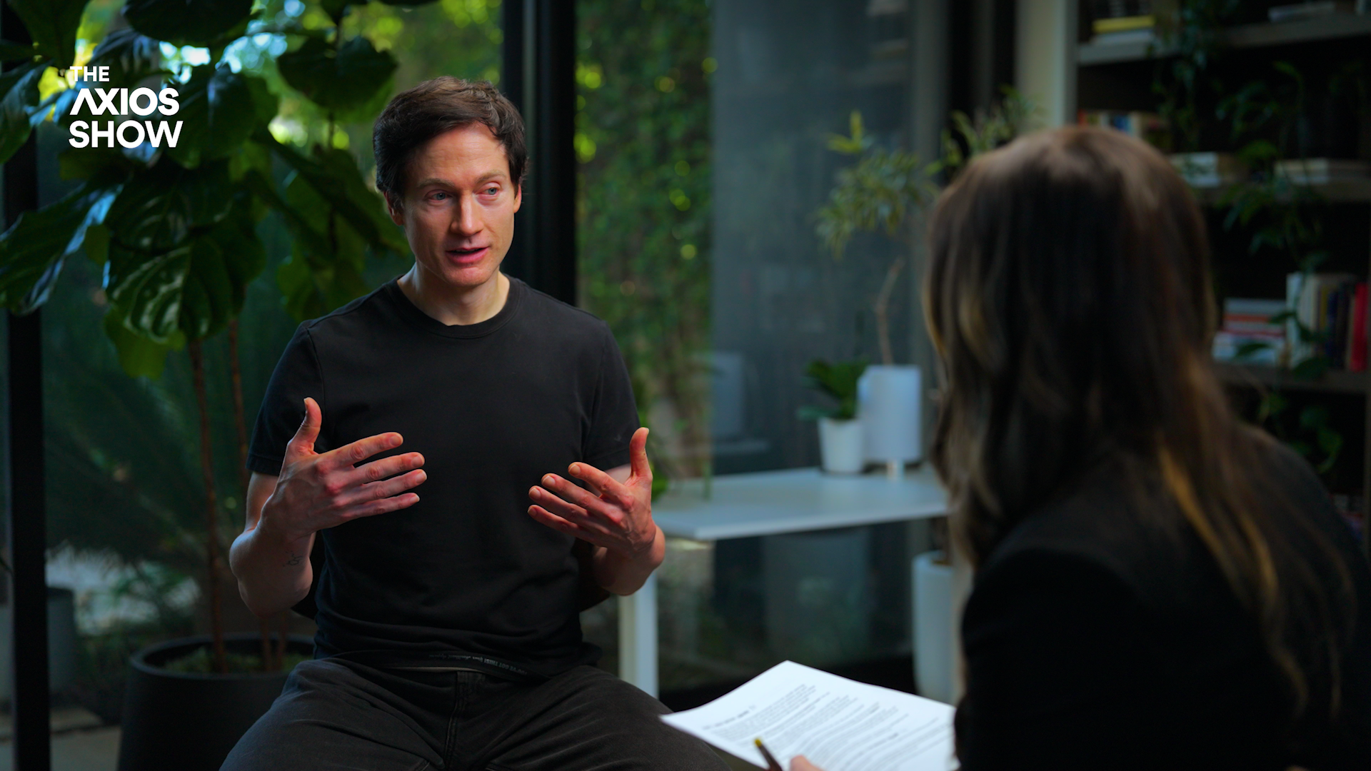 Axios' Madison Mills interviews Bryan Johnson at his Los Angeles home on Monday.