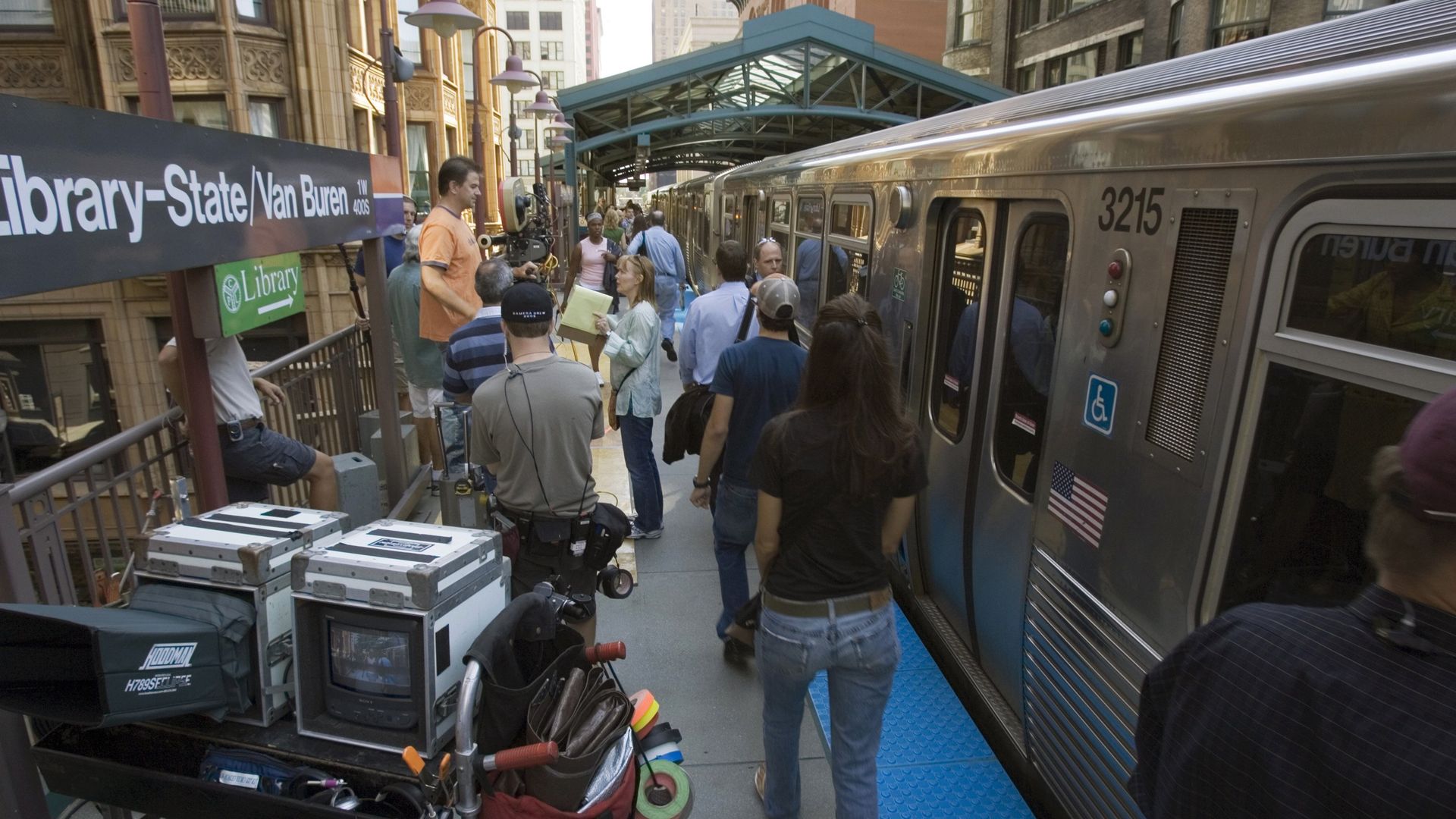 Film crew on Chicago el station 
