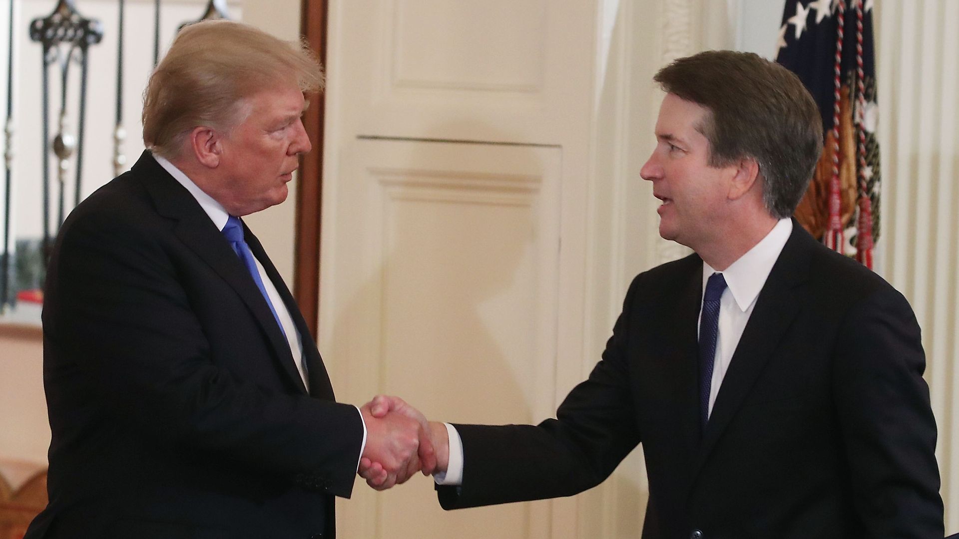 Trump and Brett Kavanaugh shake hands