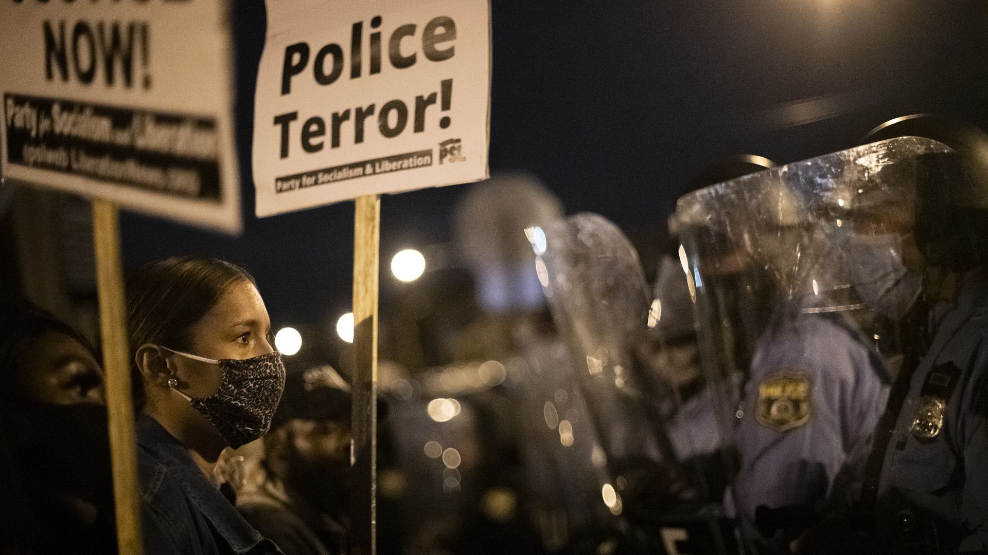 Demonstrators gather in protest near the location where Walter Wallace, Jr. was killed by two police officers on October 27