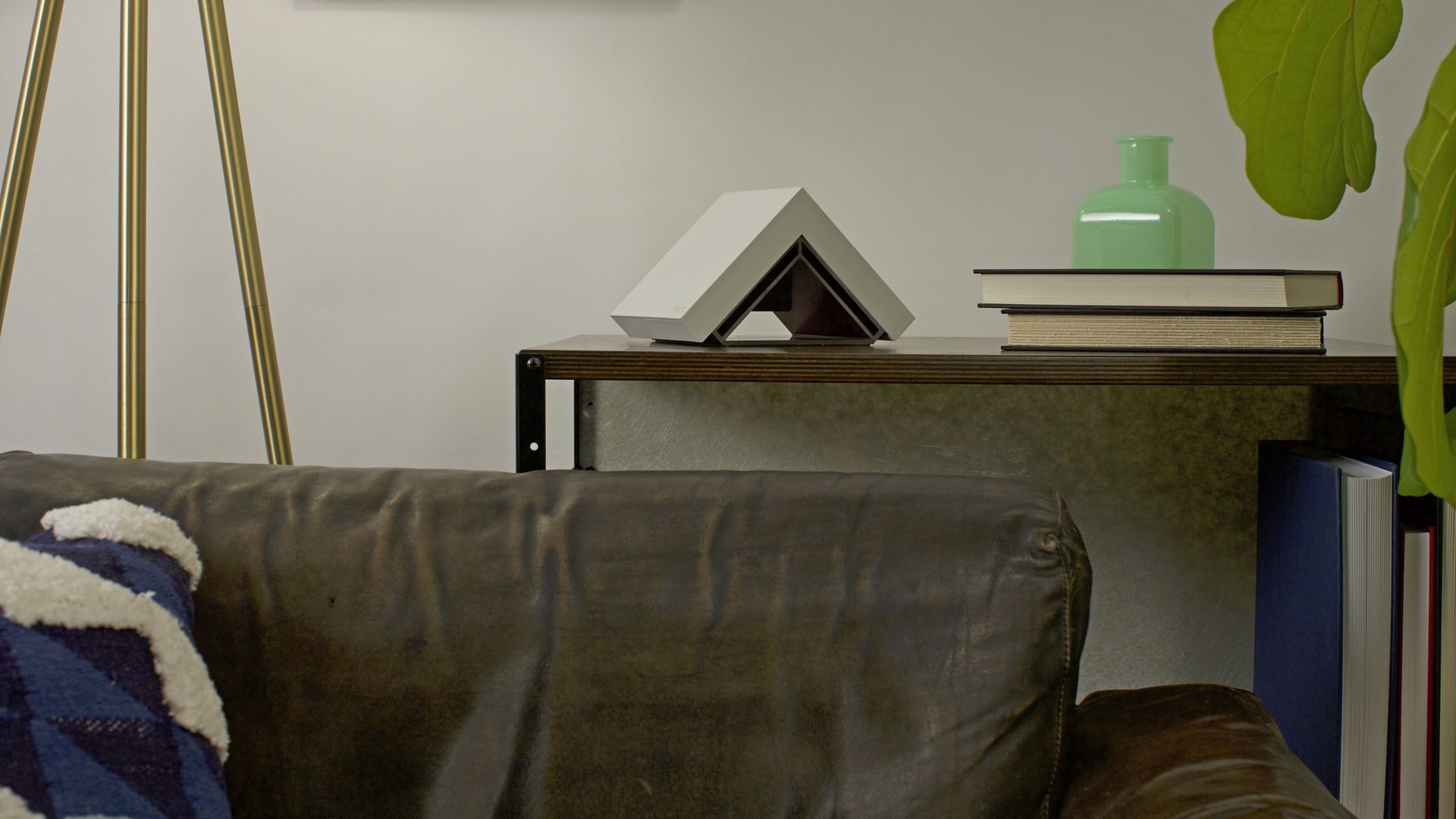 Helm's triangular e-mail server, sitting in a living room