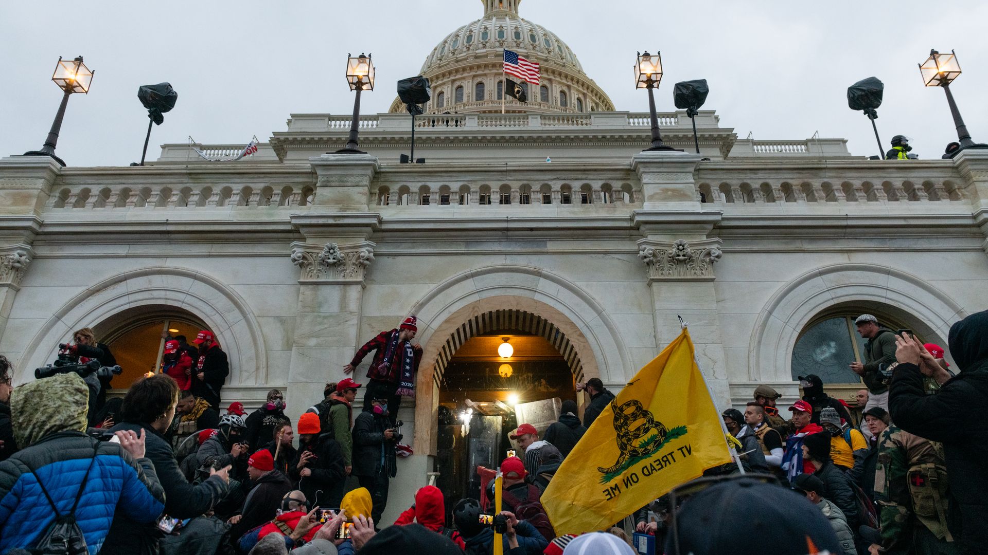 Photo of Trump supporters crowding an entry into the Capitol building during the Jan. 6 riots
