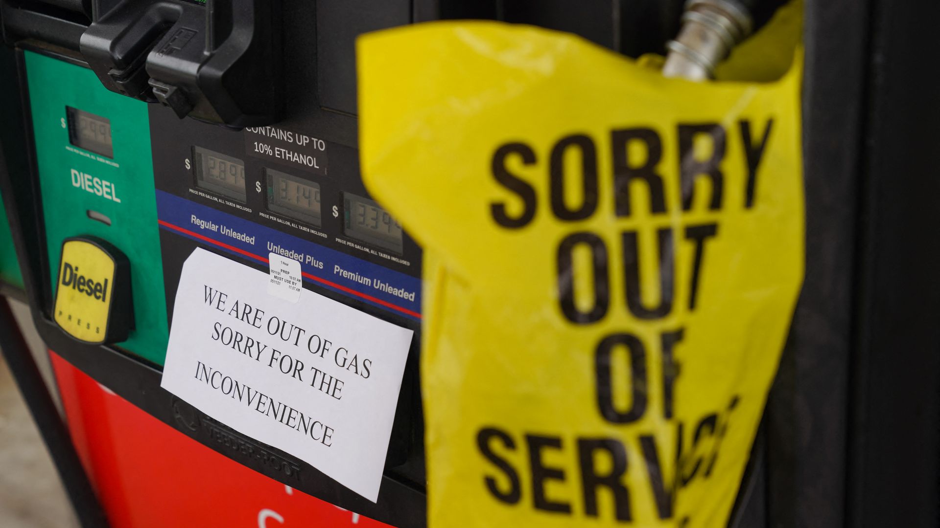 A sign warns consumers on the avaliability of gasoline at a RaceTrac gas station on May 11, 2021, in Smyrna, Georgia.