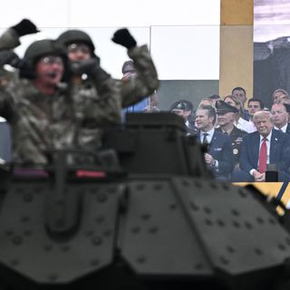 Trump hosts military parade amid nationwide "No Kings" protests, in photos