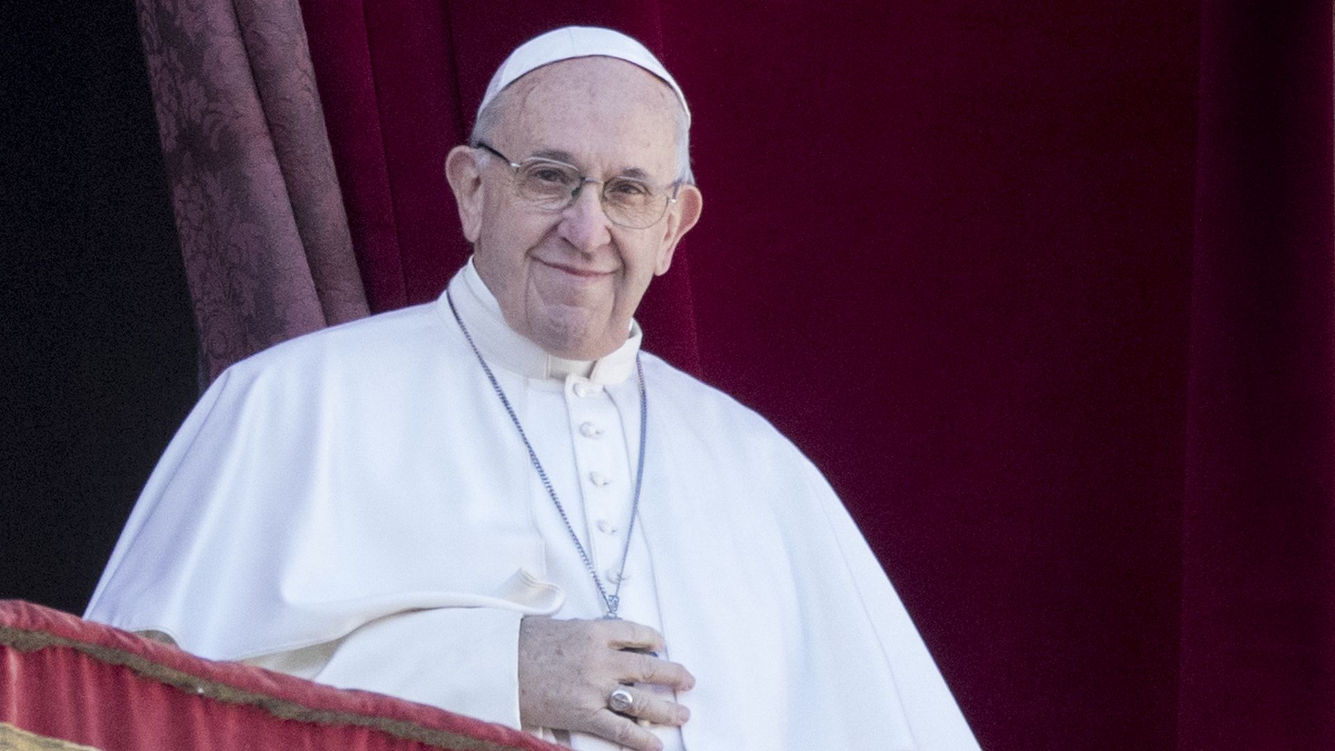 Pope francis on the balcony of St. Peter's basilica