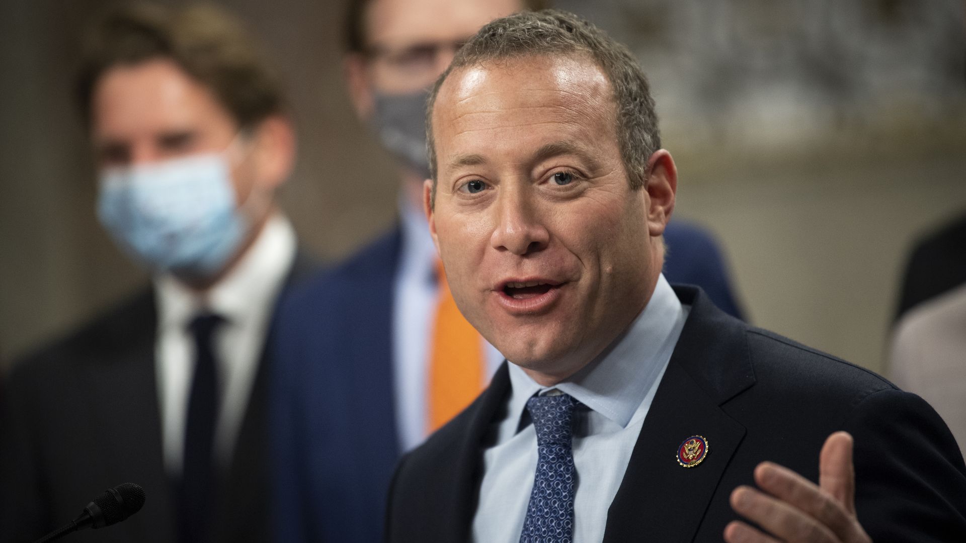 Rep. Josh Gottheimer, D-N.J., speaks during a news conference with a group of bipartisan lawmakers