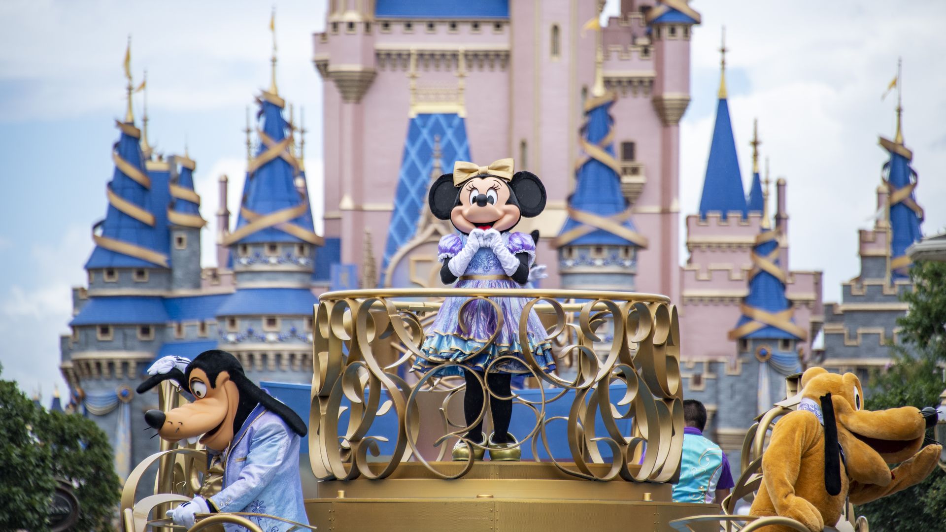 Disney characters appear during a parade
