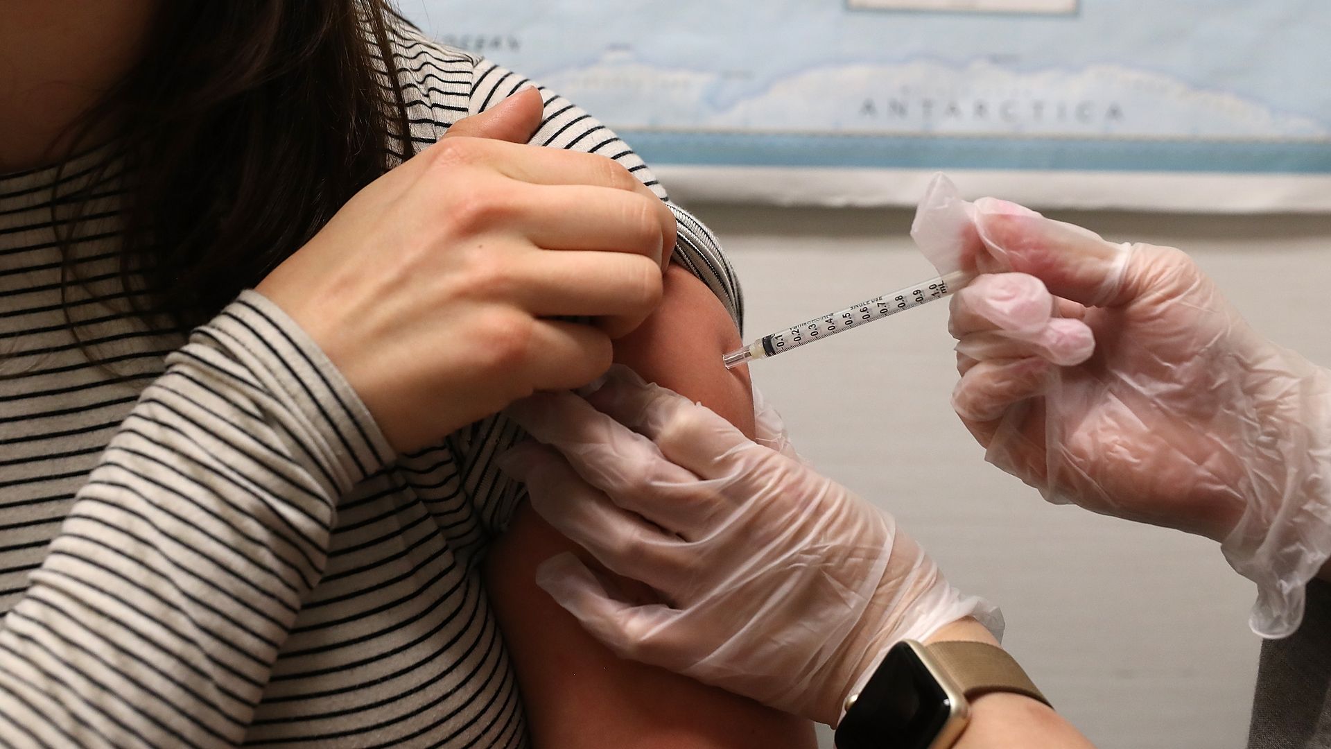 someone getting the flu shot