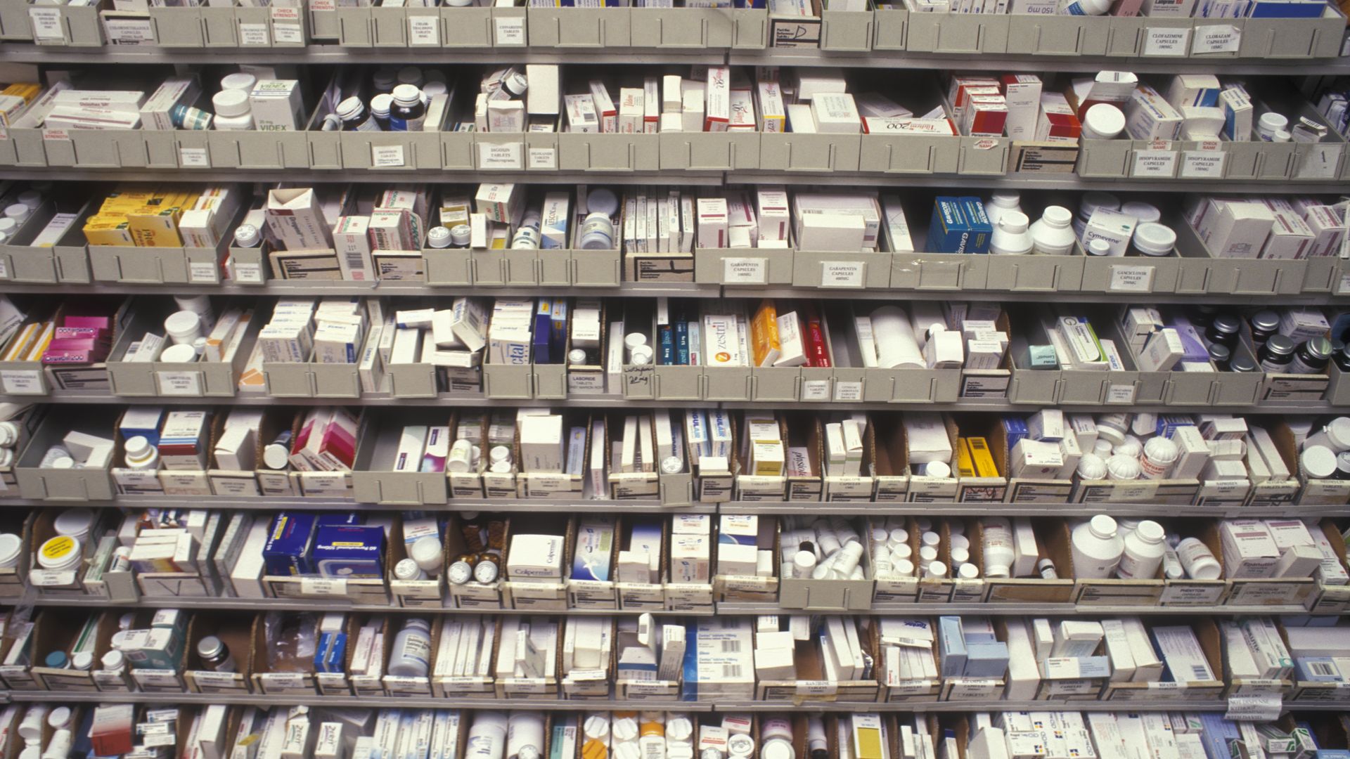 Prescription drugs on a shelf in a pharmacy.