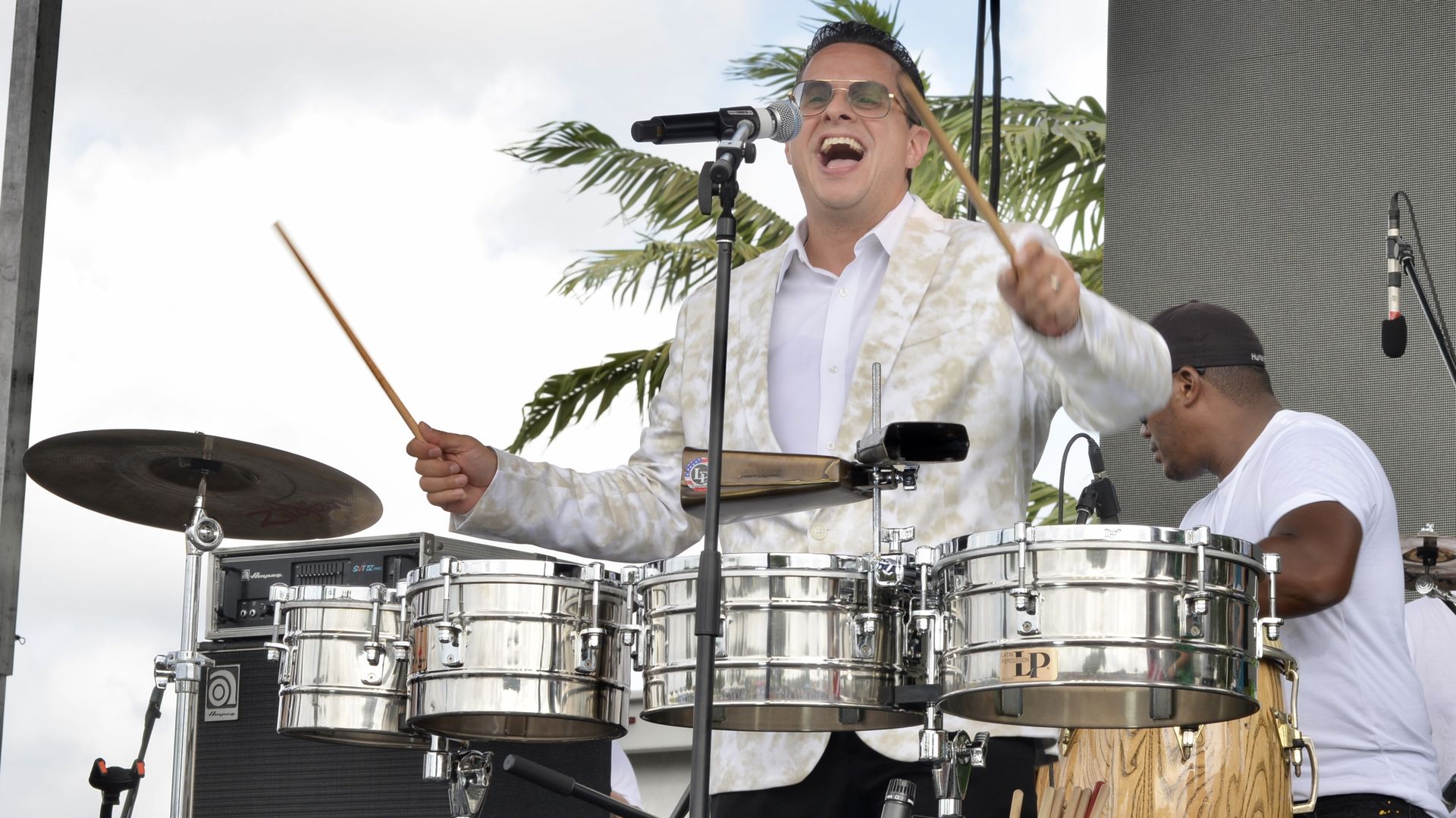 Tito Puente Jr. sings during Carnaval Miami's "Noche de Carnaval" at the Miami-Dade Fair & Expo Center.