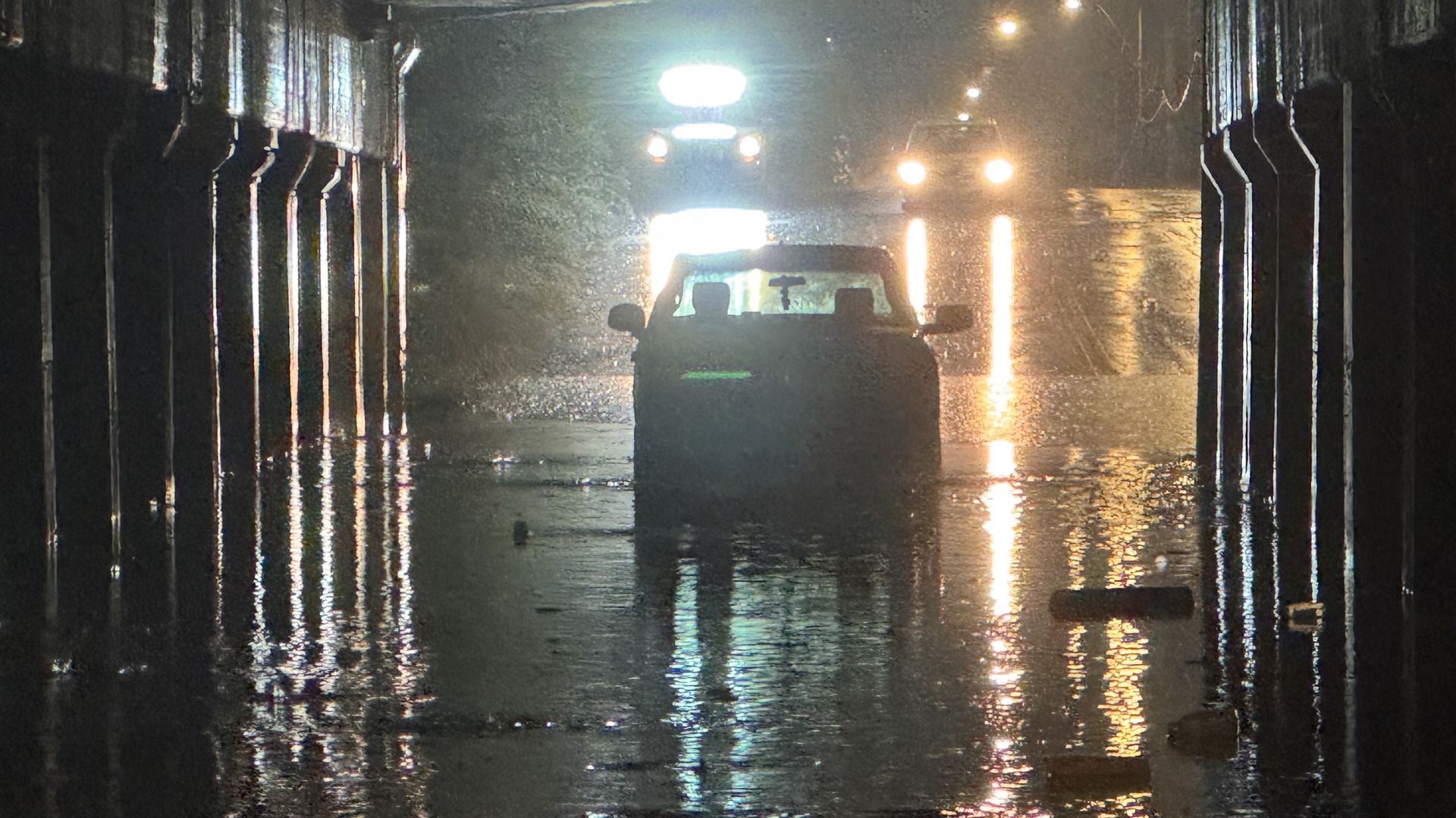 Car stuck in the flood water in Kansas City.