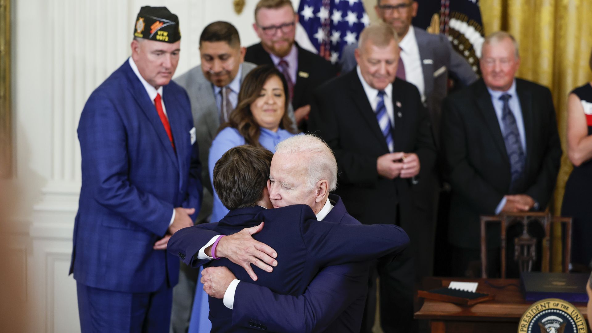 Biden embracing his grandson