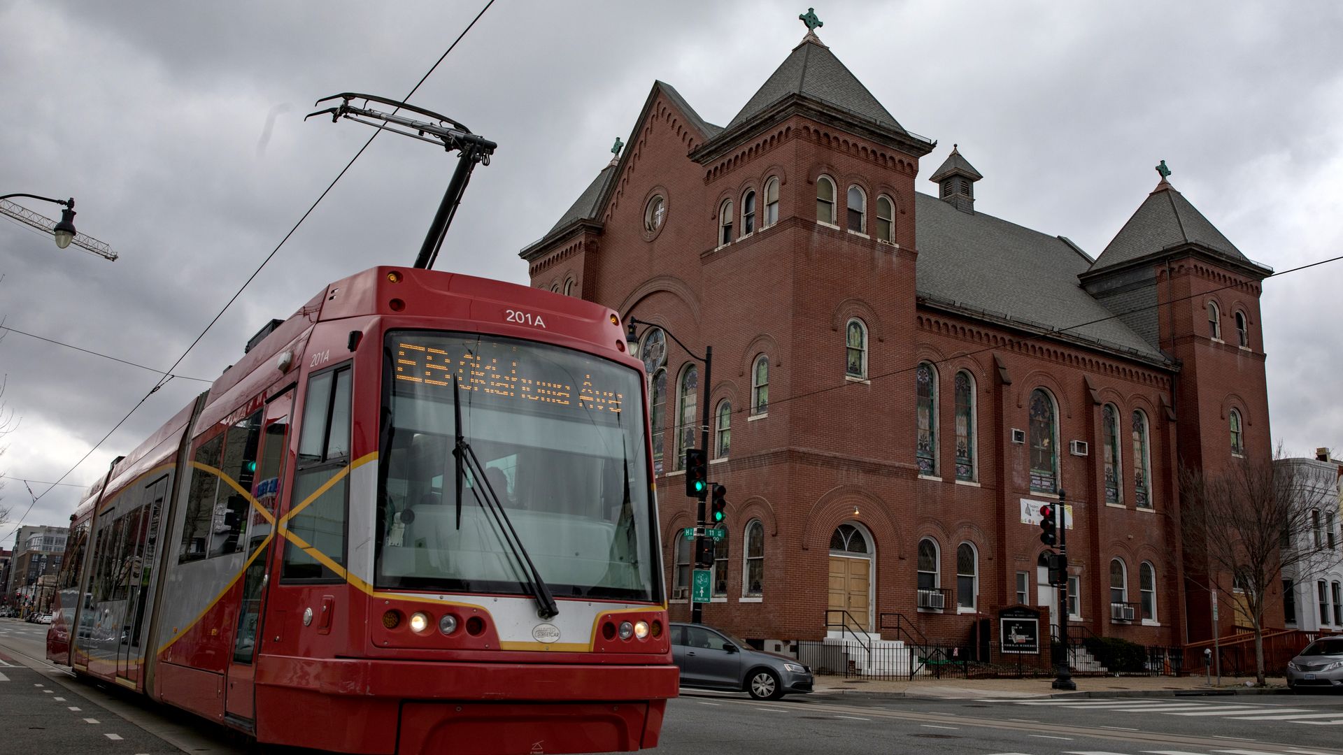 A streetcar driving down a D.C. street.