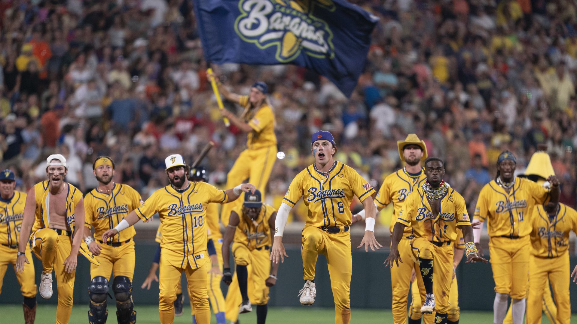 Savannah Bananas perform a routine during a game against the Party Animals at Memorial Stadium on April 26, 2025 in Clemson, South Carolina. A record-breaking crowd of 80,000 reportedly attended the game, the first of ten Savannah Bananas baseball games to be broadcast this summer by ESPN, and the f