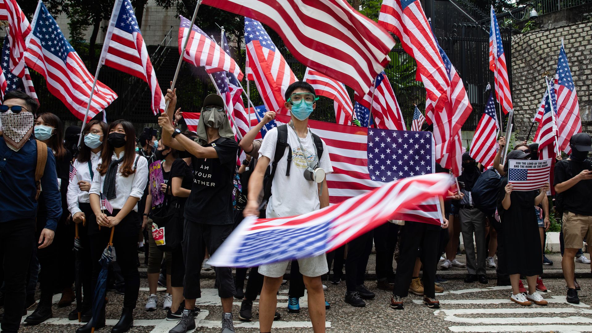 Hong Kong protesters wave US flags outside US consulate