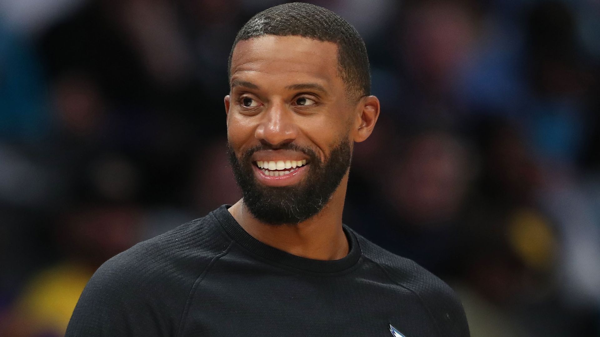 Head Coach Charles Lee of the Charlotte Hornets looks on during the game against the Los Angeles Lakers on November 10, 2025 at Spectrum Center in Charlotte, North Carolina. NOTE TO USER: User expressly acknowledges and agrees that, by downloading and or using this photograph, User is consenting to