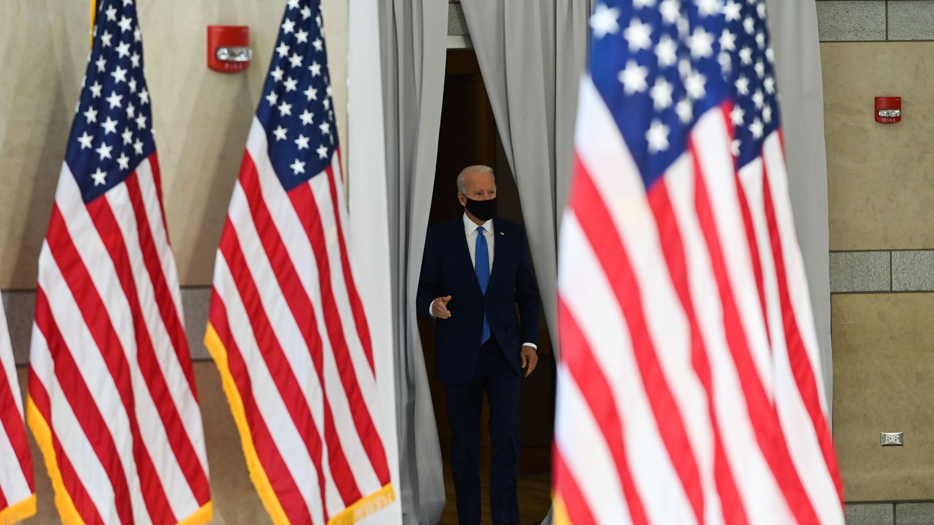 Democratic presidential nominee and former Vice President Joe Biden enters the hall at the National Constitution Center in Philadelphia
