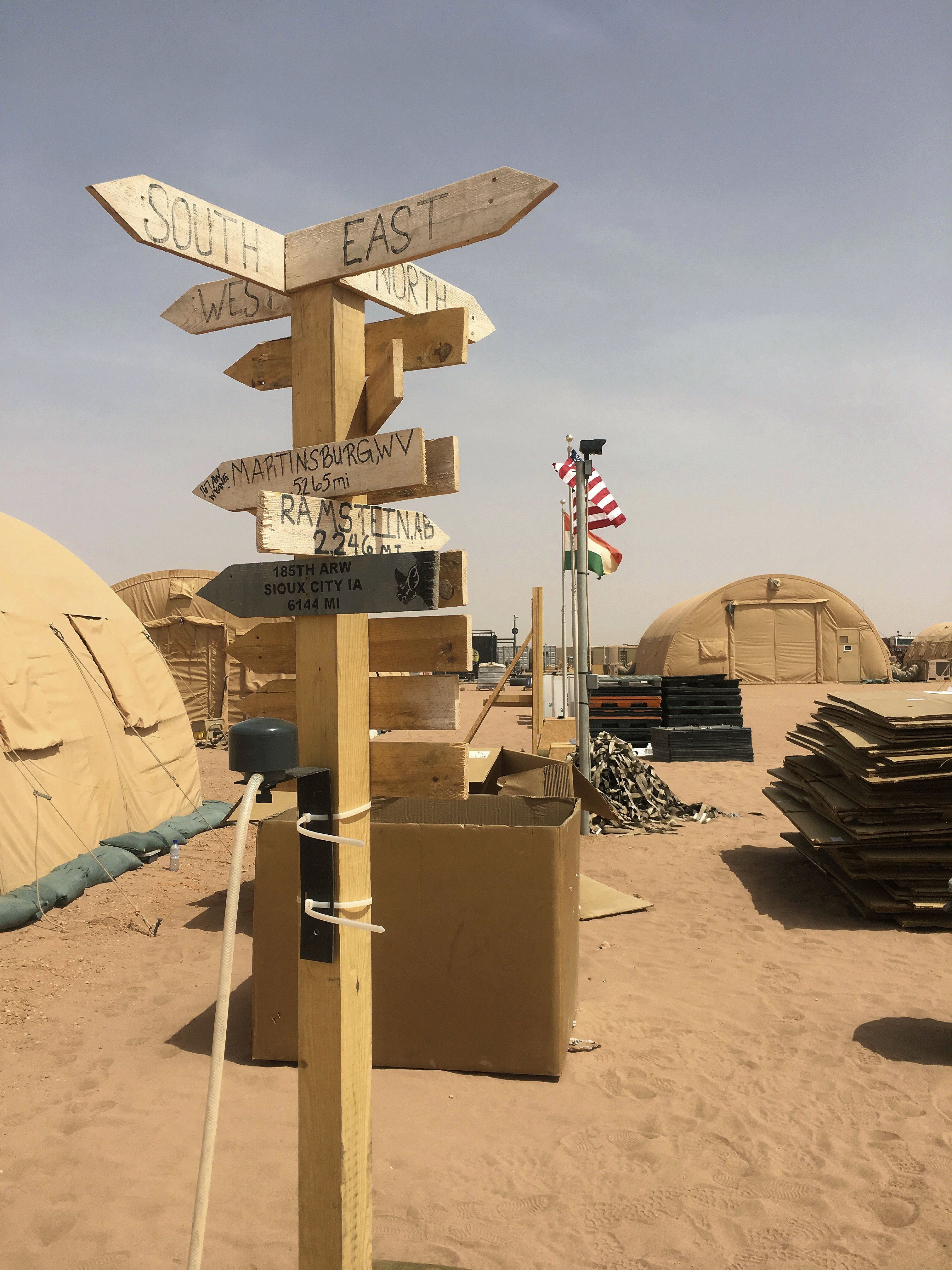 A direction and distance marker at Air Base 201 in Niger.