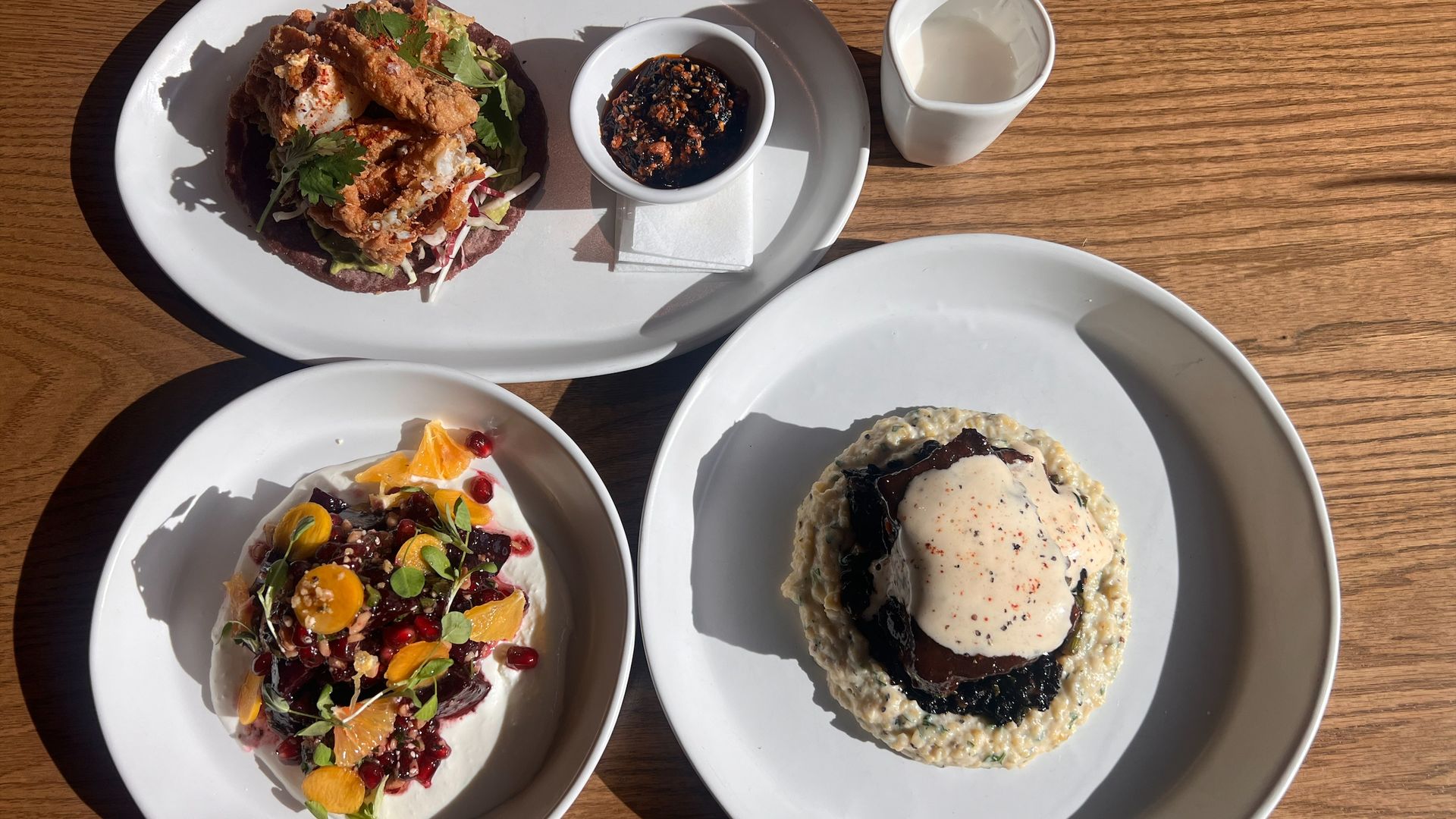 three dishes atop a table