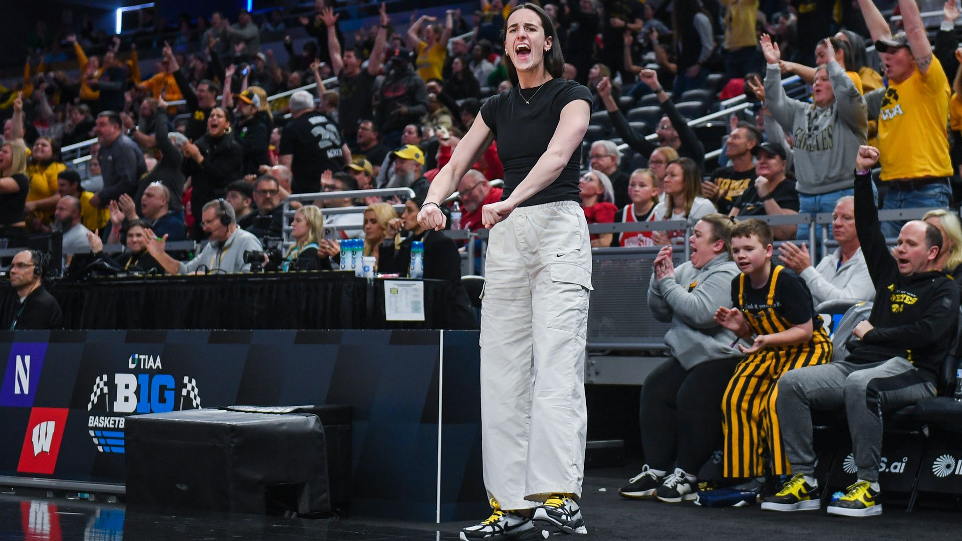 Caitlin Clark at the arena in Indiana cheering
