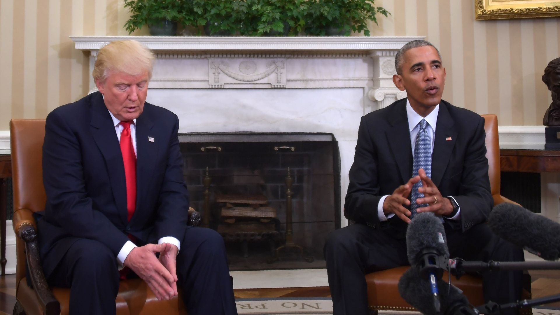 Trump and Obama meet in the Oval Office.