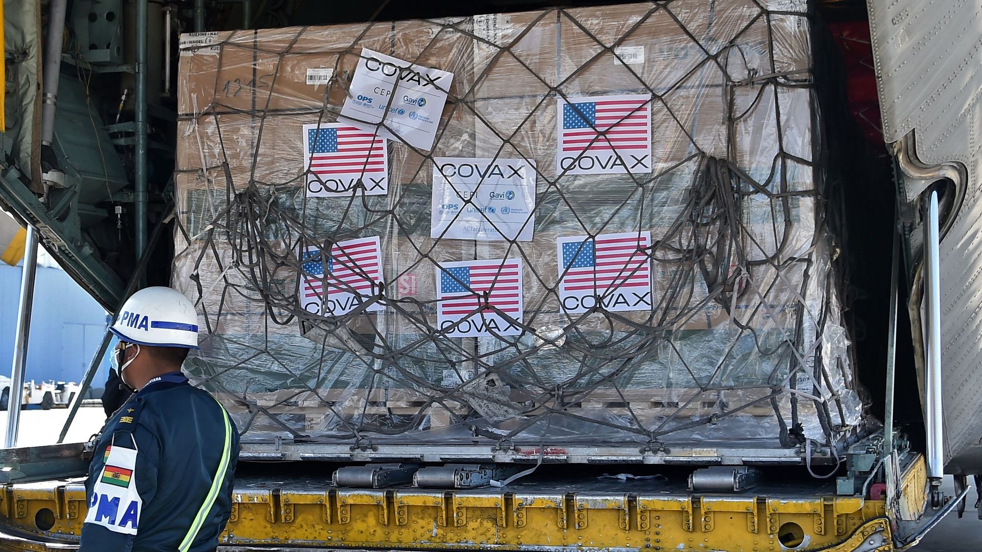 View of boxes containing some of 1,008,000 doses of US Johnson & Johnson vaccines against COVID-19 donated through the COVAX mechanism, upon their arrival at the Air Force base in El Alto, Bolivia.