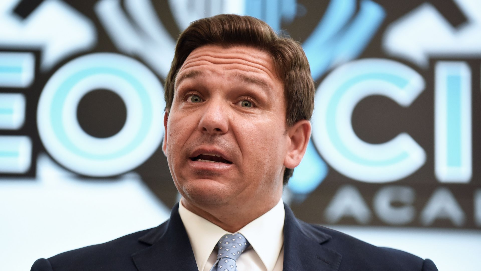   Florida Gov. Ron DeSantis speaks during a press conference at Neo City Academy in Kissimmee, Florida. 