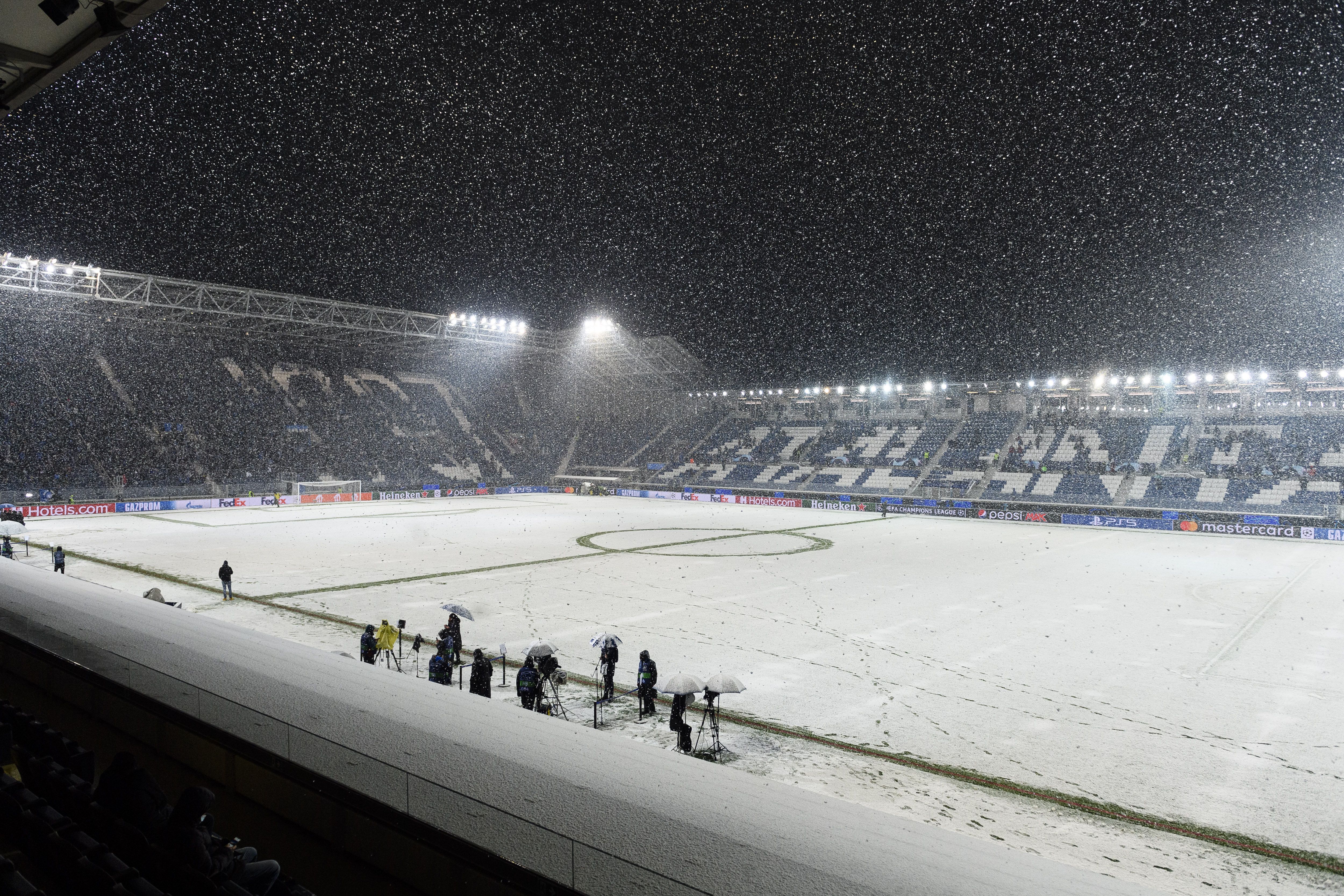 Snow on soccer pitch