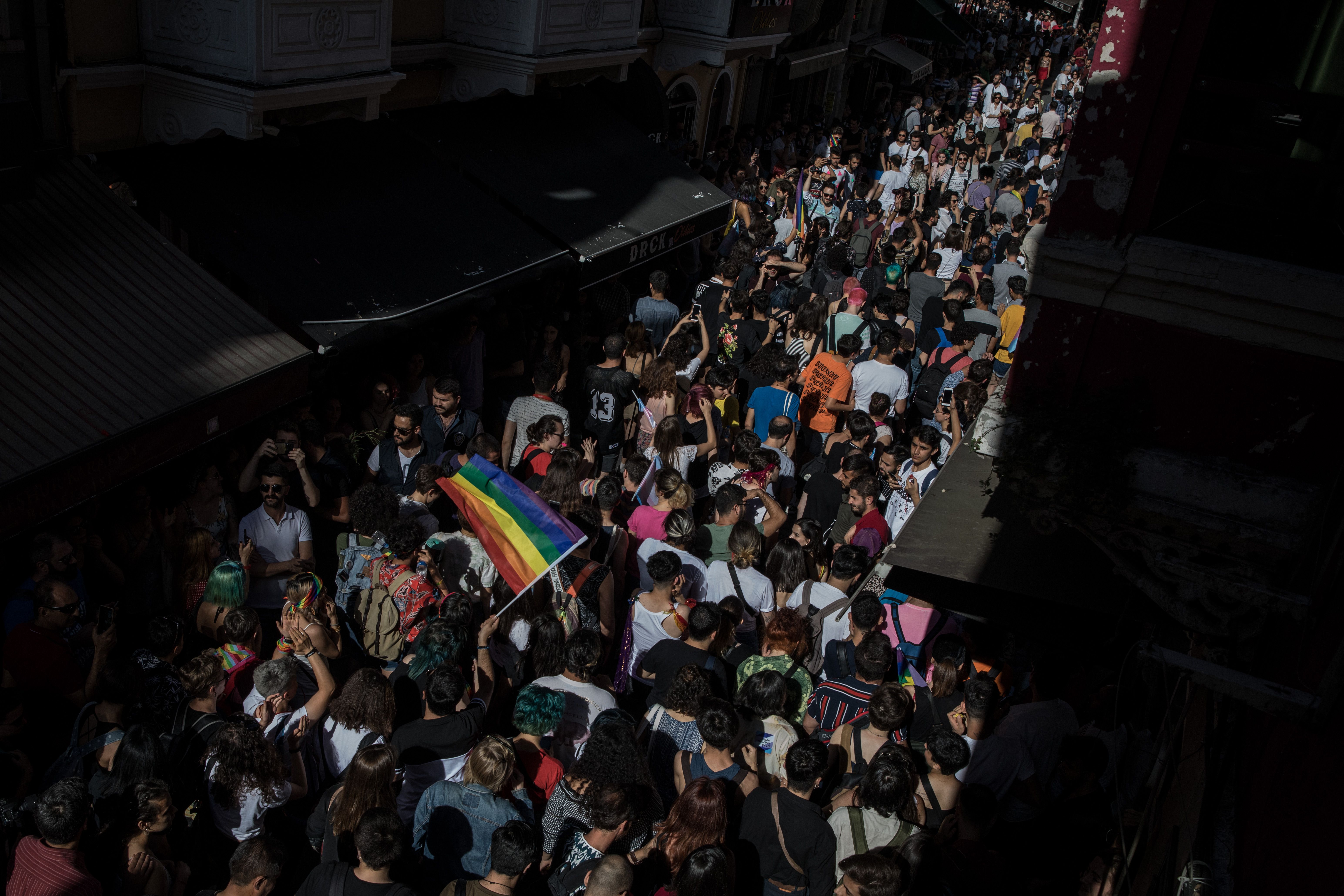 LGBT supporters walk down a street on June 30, 2019 in Istanbul, Turkey. 