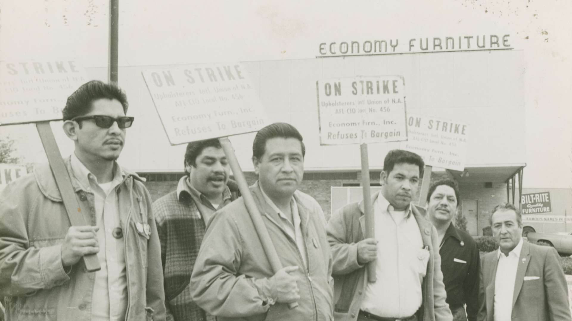 Cesar Chavez and others on the picket line in front of the Economy Furniture Company