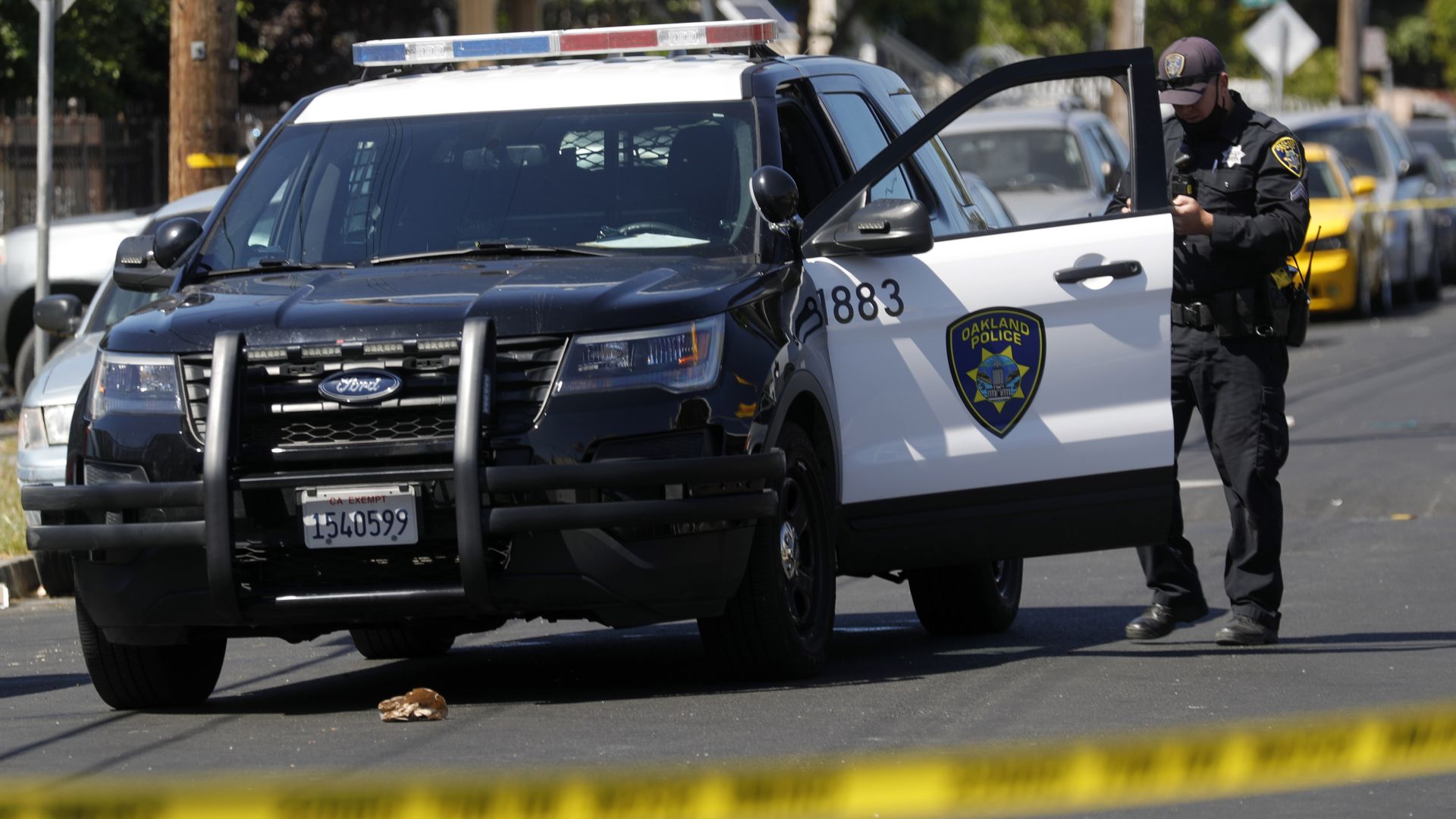 Oakland police investigate the scene of a homicide in Oakland, Calif., after police responded to a ShotSpotter alert. 