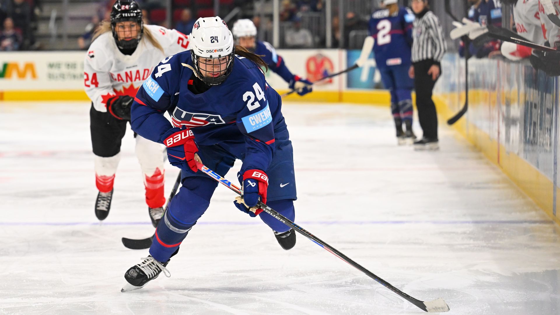 Joy Dunne of United States hockey leads a breakaway toward goal