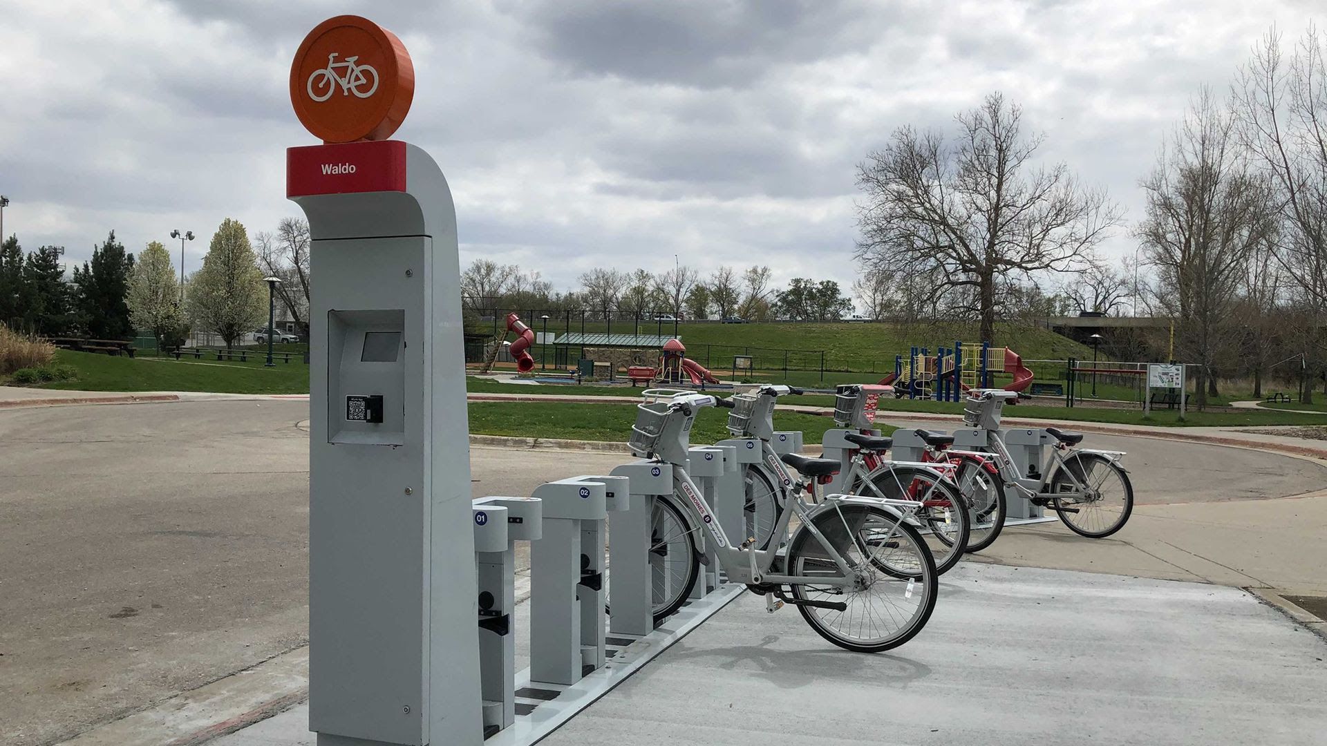 Two electric bikes are docked at a BCycle station in the Des Moines metro area.